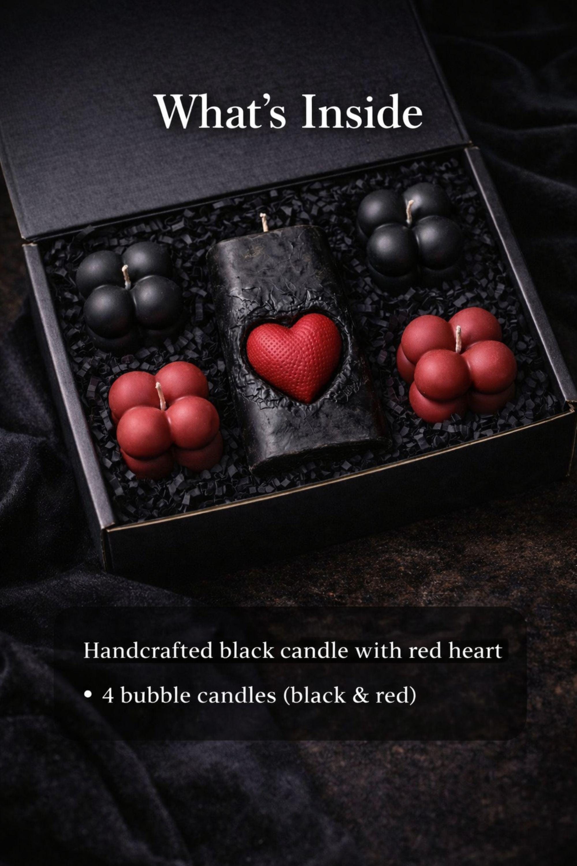 Gothic Sacred Heart Ritual Box featuring a handcrafted black candle with a red heart centerpiece and black and red bubble candles arranged in a dark gift box. This dark ritual candle set is designed for gothic home decor, witchy interiors, and alternative spiritual gifts. Unique handmade candle box with dramatic dark aesthetic, perfect for altar decor, shelves, or intentional spaces.