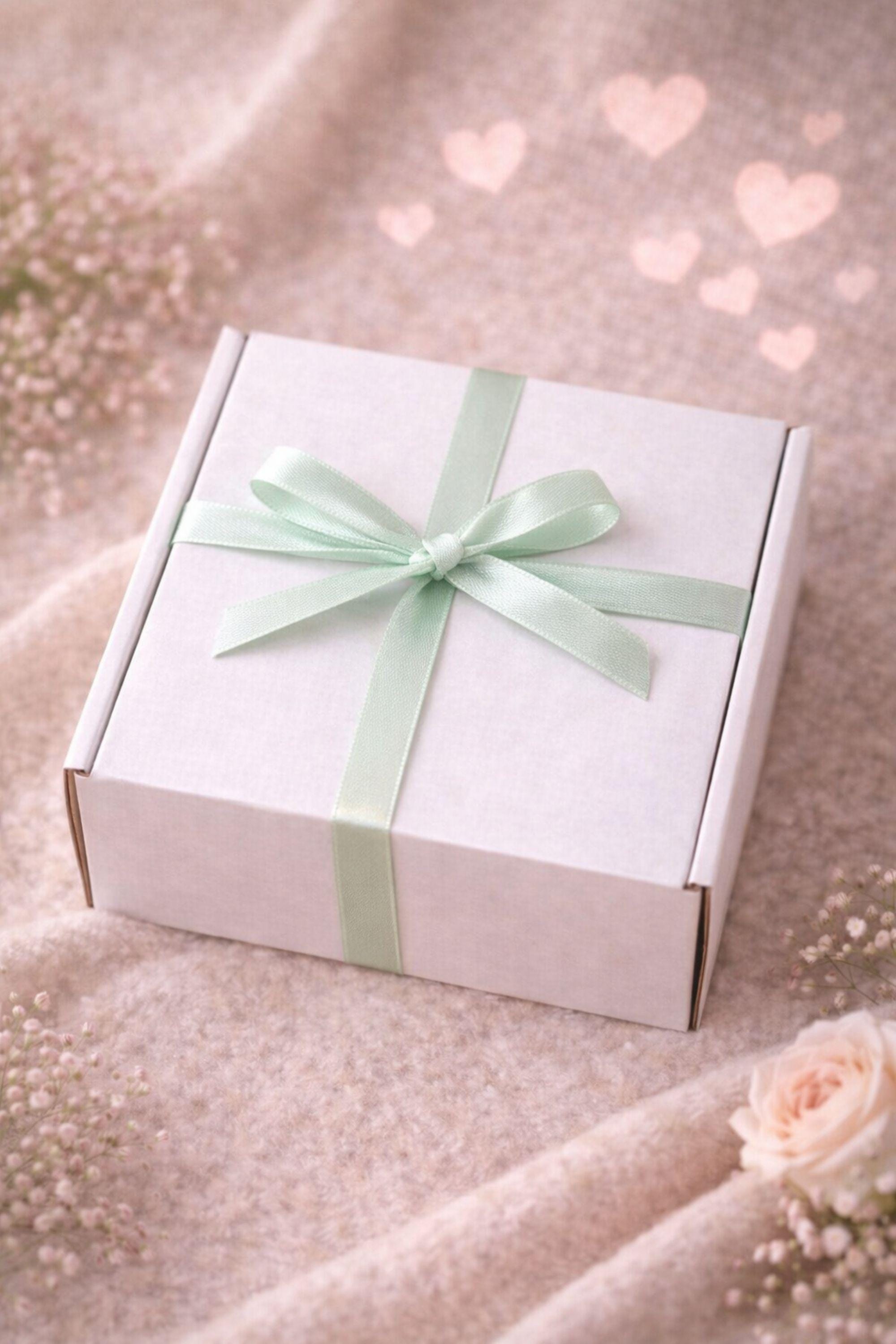 Closed Valentine gift box wrapped neatly and ready to gift, presented in a clean, minimal style with soft neutral colors. Handmade Valentine care package prepared as a calm and thoughtful gift for her, perfect for easy gifting, sending comfort, and sharing a gentle Valentine gesture without bold or flashy elements.