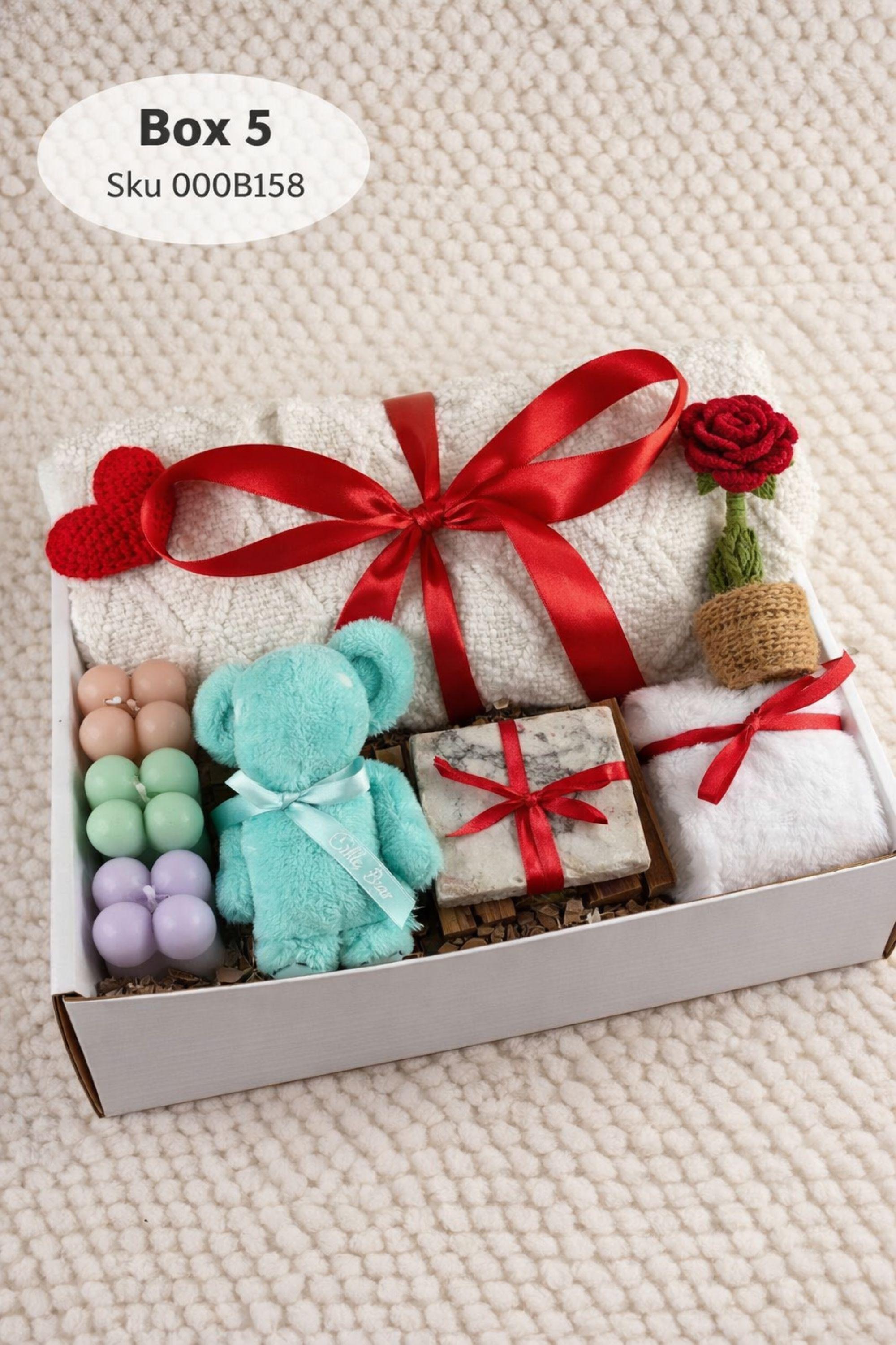 Valentine gift box with soft cozy blanket, candle, handmade soap, plush comfort items, and romantic heart details arranged in a gift-ready box. This cozy romantic Valentine care package is designed to send love, warmth, and comfort, perfect for long distance Valentine gifting, self love moments, or a thoughtful romantic surprise for her.