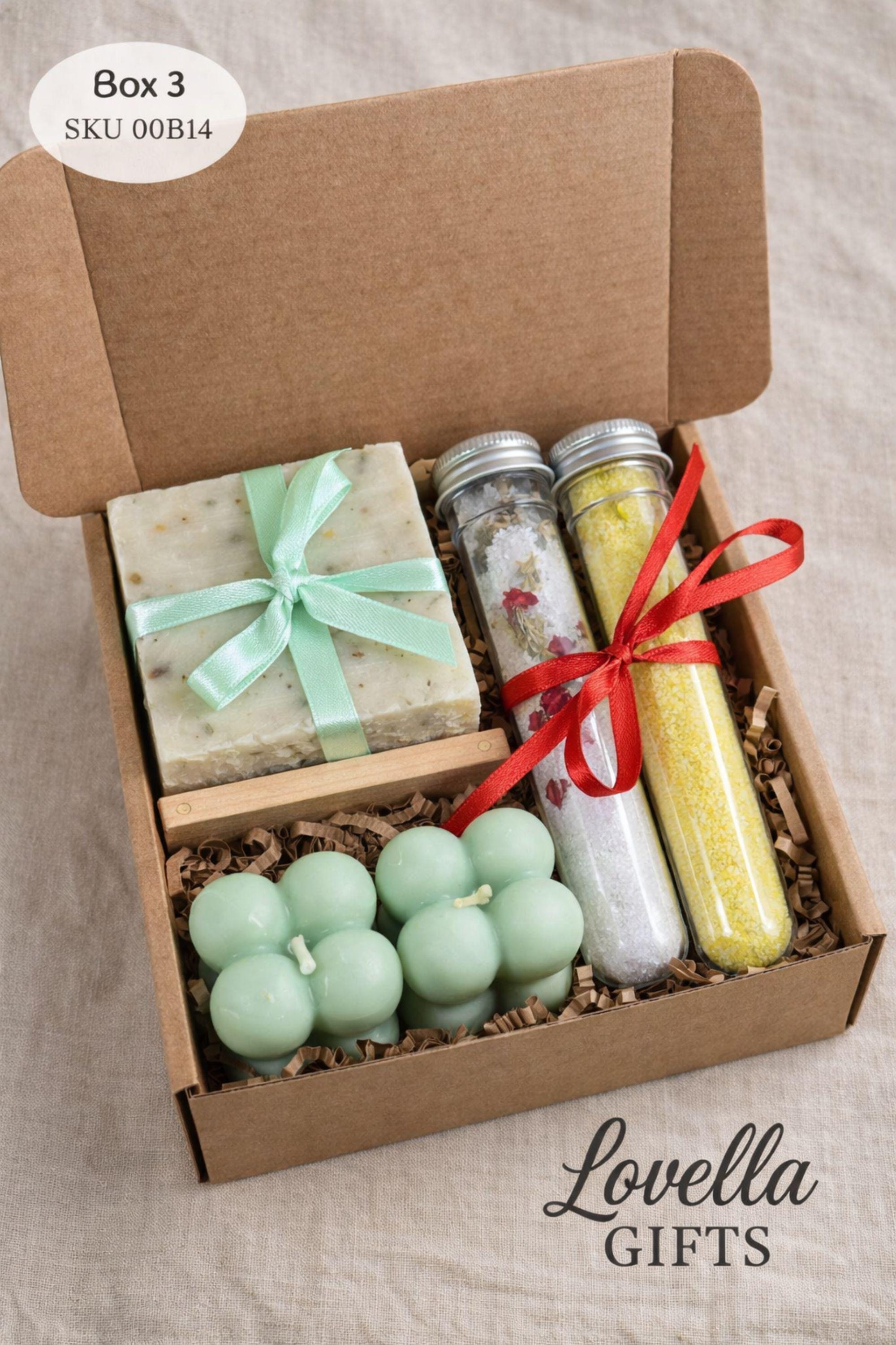 Valentines gift box shown open with a bubble candle, handmade soap tied with ribbon, and two glass tubes filled with bath salts arranged inside a small kraft box. This romantic Valentine’s Day care package is designed as a cozy and thoughtful gift, perfect for surprising someone special with a handmade valentine present that feels warm, meaningful, and ready to give.