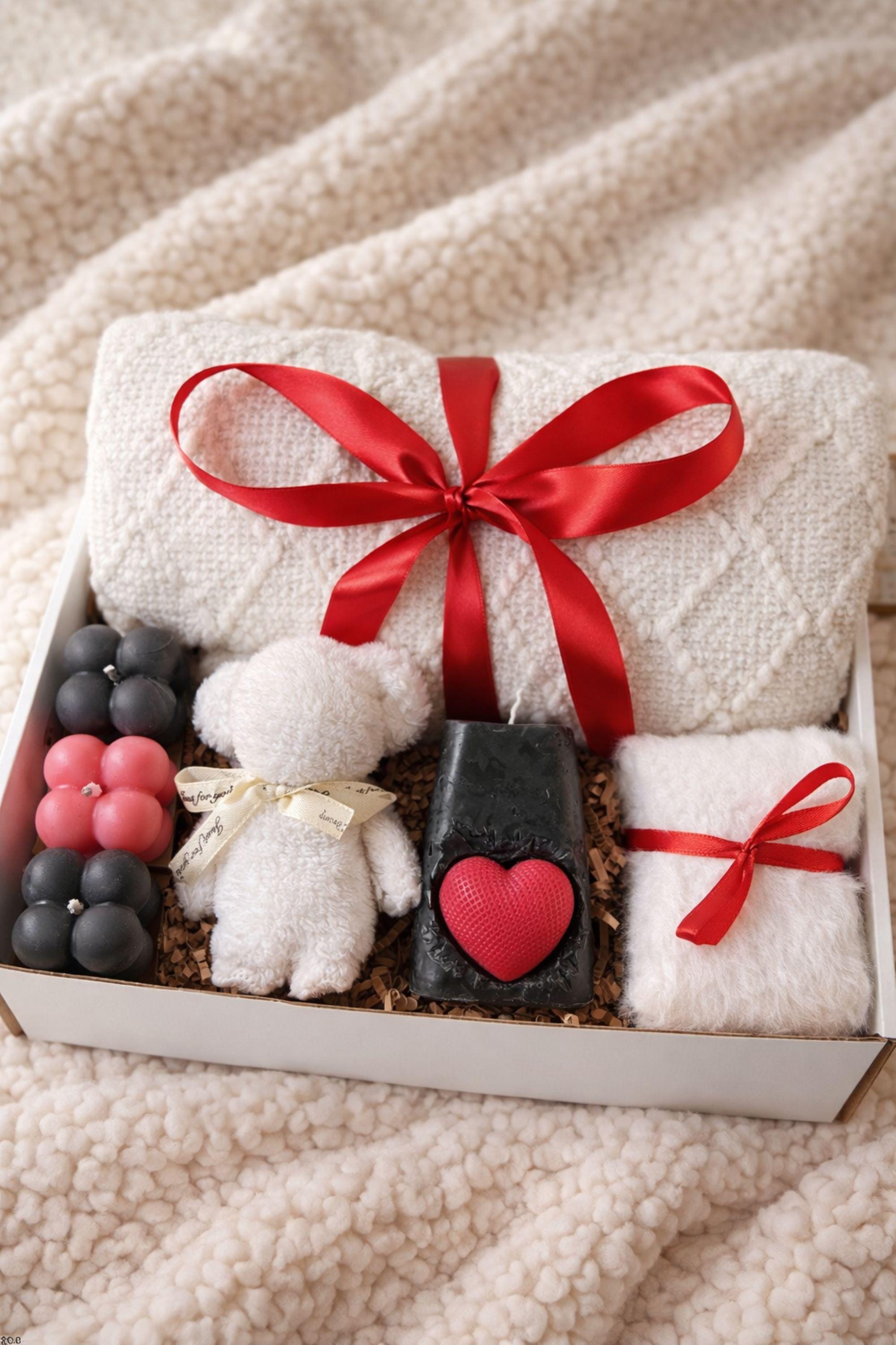 Cozy Valentine gift box for her displayed on a soft cream knitted background, featuring handmade bubble candles, a heart-shaped artisan soap, plush cozy bear, and spa-inspired self care items arranged in a gift-ready box. This romantic Valentine care package is a thoughtful self care gift for girlfriend, wife, sister, or loved one, designed to send comfort, warmth, and love with handmade details and ready-to-gift packaging.