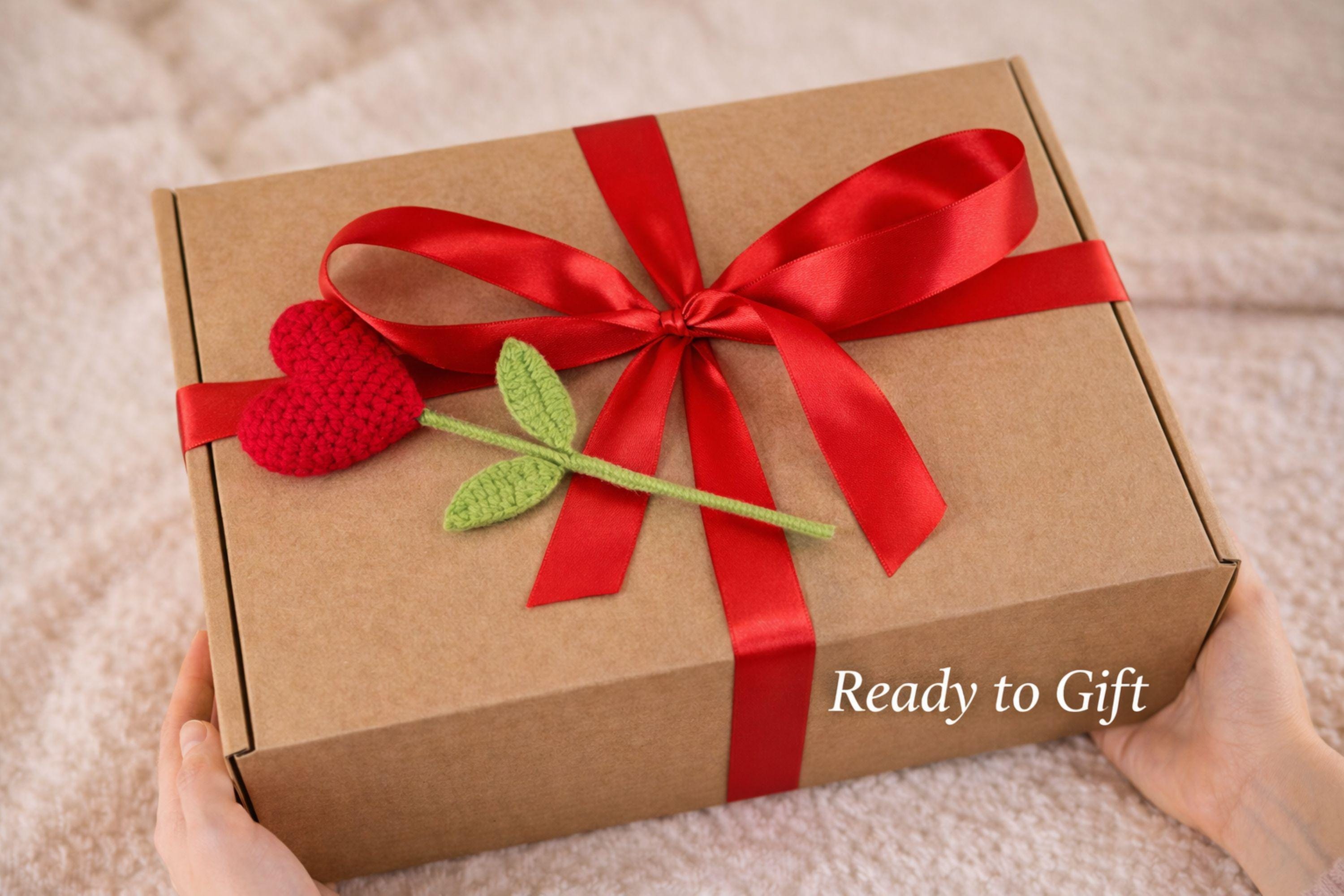 Cozy Valentine gift box for her displayed on a soft cream knitted background, featuring handmade bubble candles, a heart-shaped artisan soap, plush cozy bear, and spa-inspired self care items arranged in a gift-ready box. This romantic Valentine care package is a thoughtful self care gift for girlfriend, wife, sister, or loved one, designed to send comfort, warmth, and love with handmade details and ready-to-gift packaging.