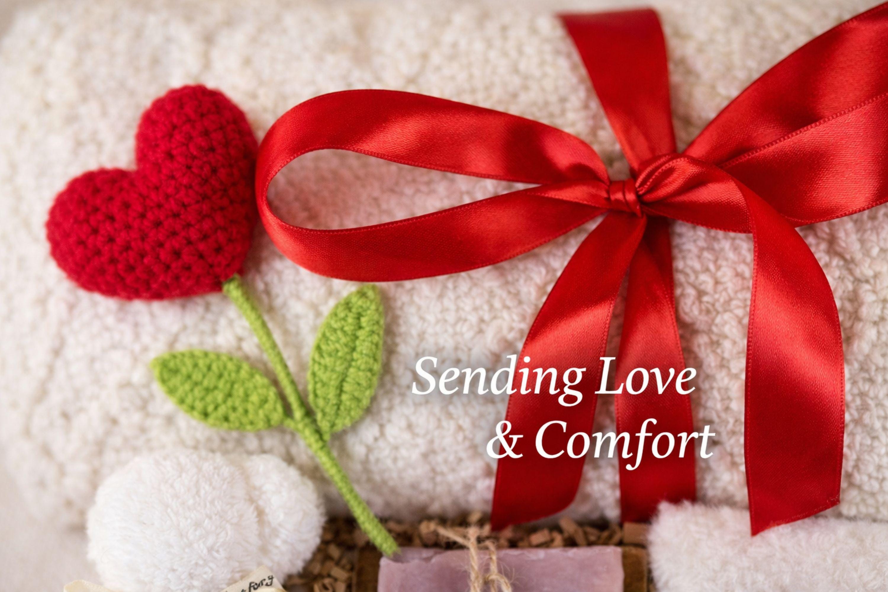 Valentine gift box with soft cozy blanket, candle, handmade soap, plush comfort items, and romantic heart details arranged in a gift-ready box. This cozy romantic Valentine care package is designed to send love, warmth, and comfort, perfect for long distance Valentine gifting, self love moments, or a thoughtful romantic surprise for her.