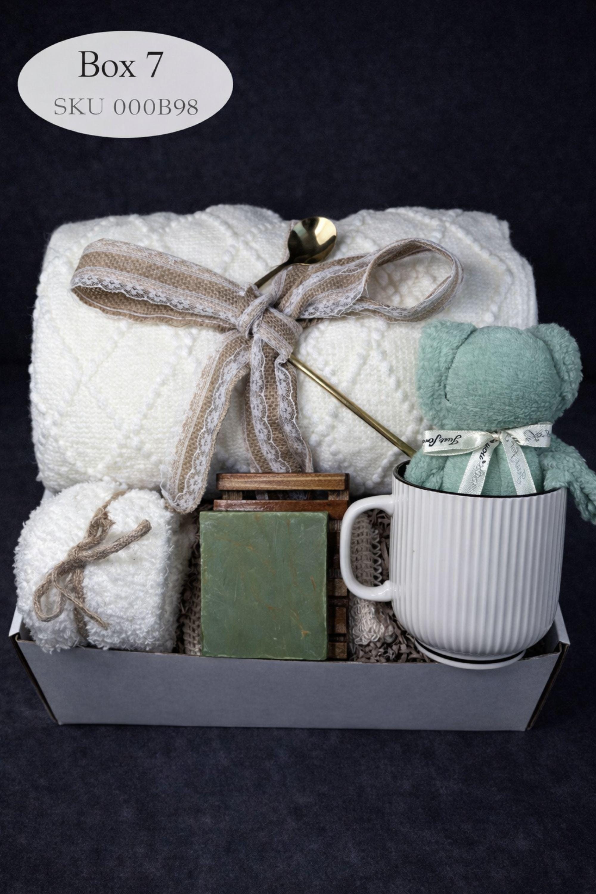 Loss of mother sympathy gift box with cozy blanket, mug, handmade soap, wooden tray, soft socks and comfort items arranged in kraft box. Bereavement care package for condolence support and memorial present. Thoughtful grief support gift for loss of mom, funeral comfort box, remembrance gesture sent directly to recipient. Elegant sympathy present designed to provide warmth and quiet comfort during difficult time.