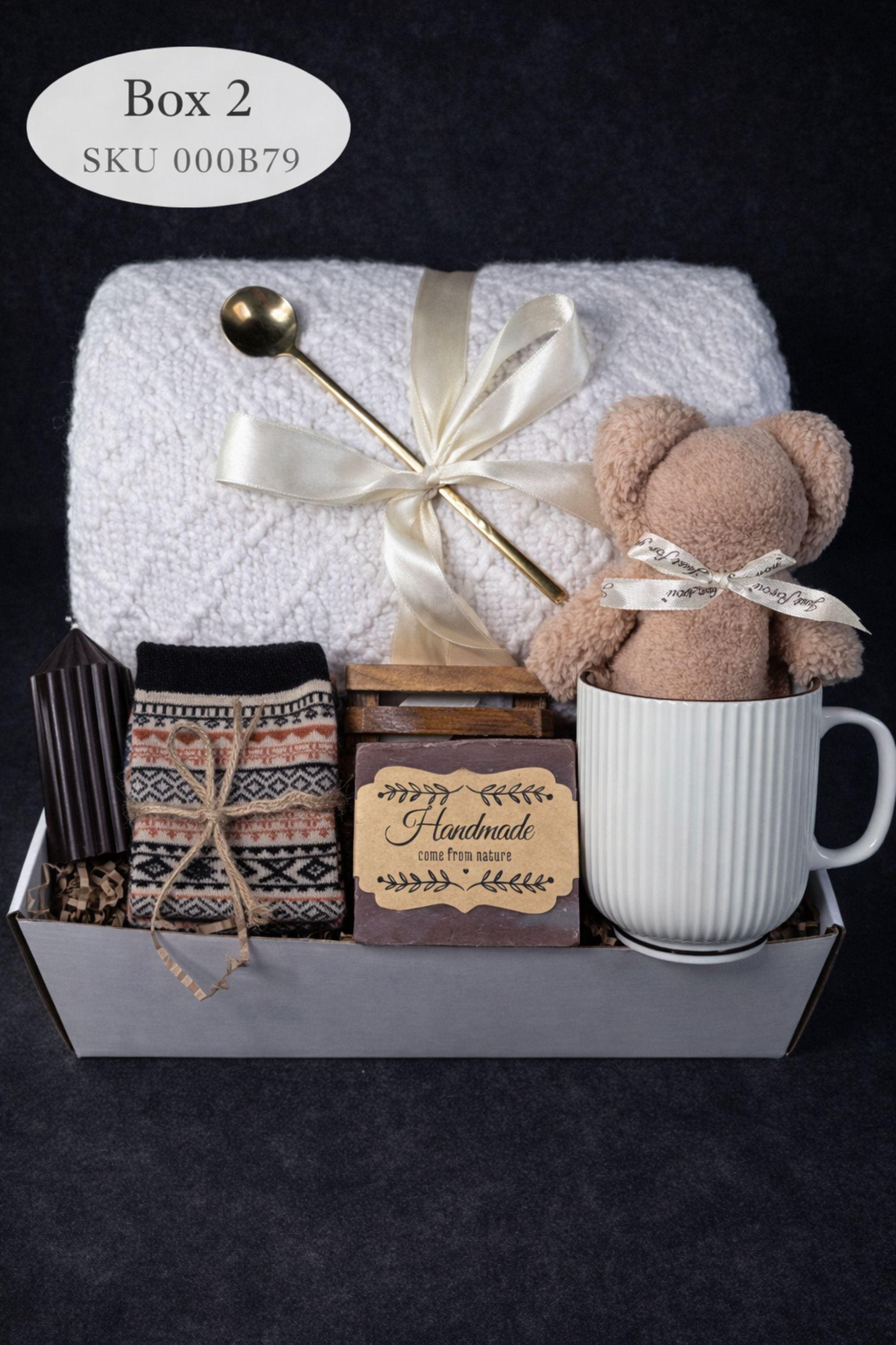 Loss of mother sympathy gift box with cozy blanket, mug, handmade soap, wooden tray, soft socks and comfort items arranged in kraft box. Bereavement care package for condolence support and memorial present. Thoughtful grief support gift for loss of mom, funeral comfort box, remembrance gesture sent directly to recipient. Elegant sympathy present designed to provide warmth and quiet comfort during difficult time.