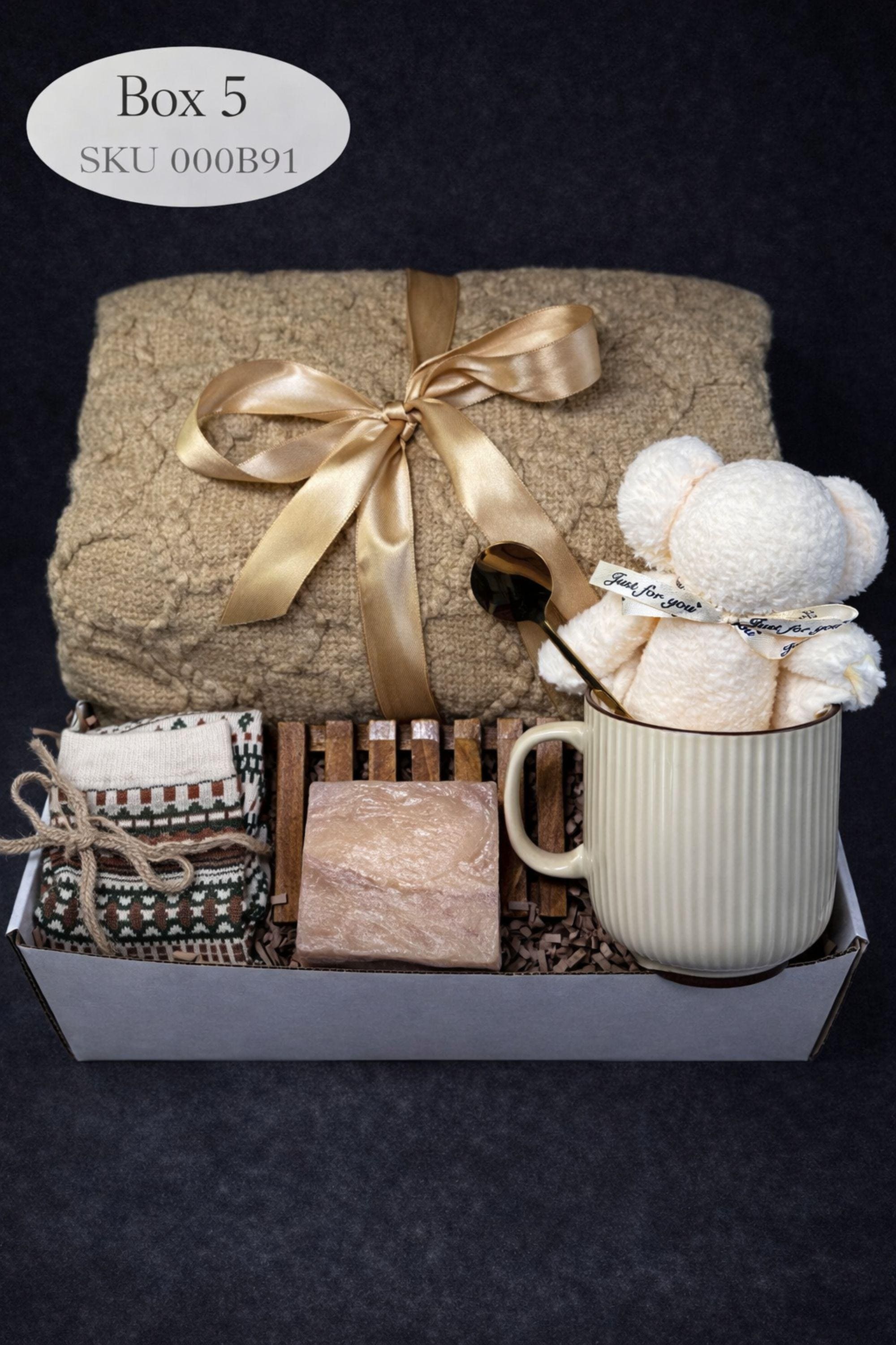 Loss of mother sympathy gift box with cozy blanket, mug, handmade soap, wooden tray, soft socks and comfort items arranged in kraft box. Bereavement care package for condolence support and memorial present. Thoughtful grief support gift for loss of mom, funeral comfort box, remembrance gesture sent directly to recipient. Elegant sympathy present designed to provide warmth and quiet comfort during difficult time.