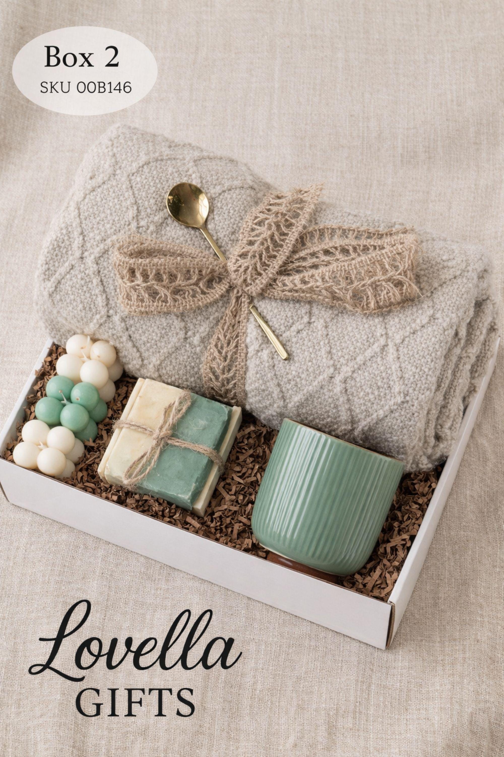 Get well soon gift box for her featuring cozy blanket, handmade soap, ceramic mug and spoon, comfort care package designed to help her feel better, thoughtful recovery gift for illness, cozy self care gift box for women, relaxing wellness gift, support gift for friend or coworker, thinking of you gift, ready to gift comfort package for rest, warmth and emotional care