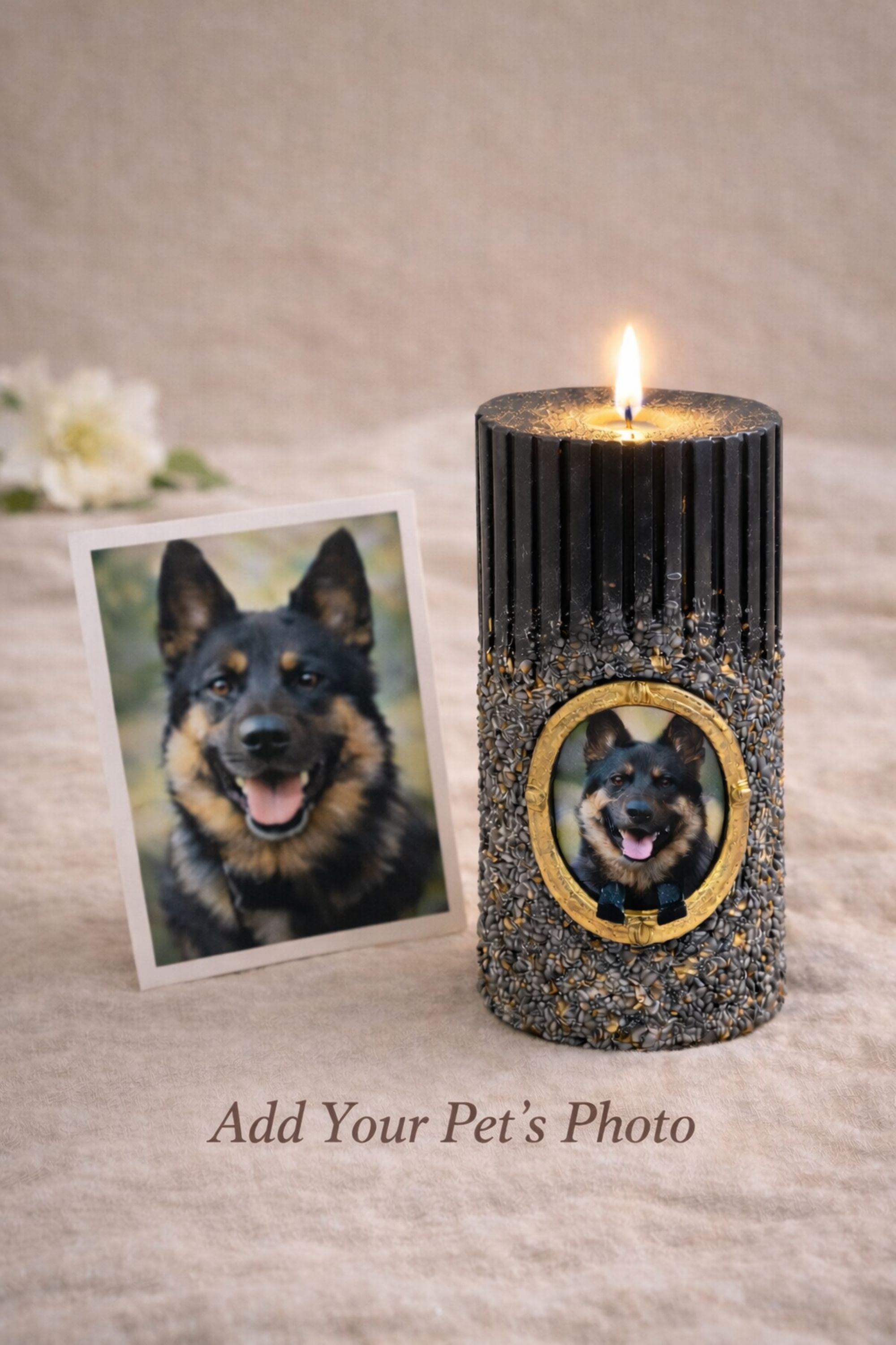 Pet memorial candle with personalized dog photo in a vintage gold frame, ribbed black candle with stone texture and gold accents, lit flame on neutral linen background, pet loss sympathy gift and dog remembrance candle honoring a beloved pet.