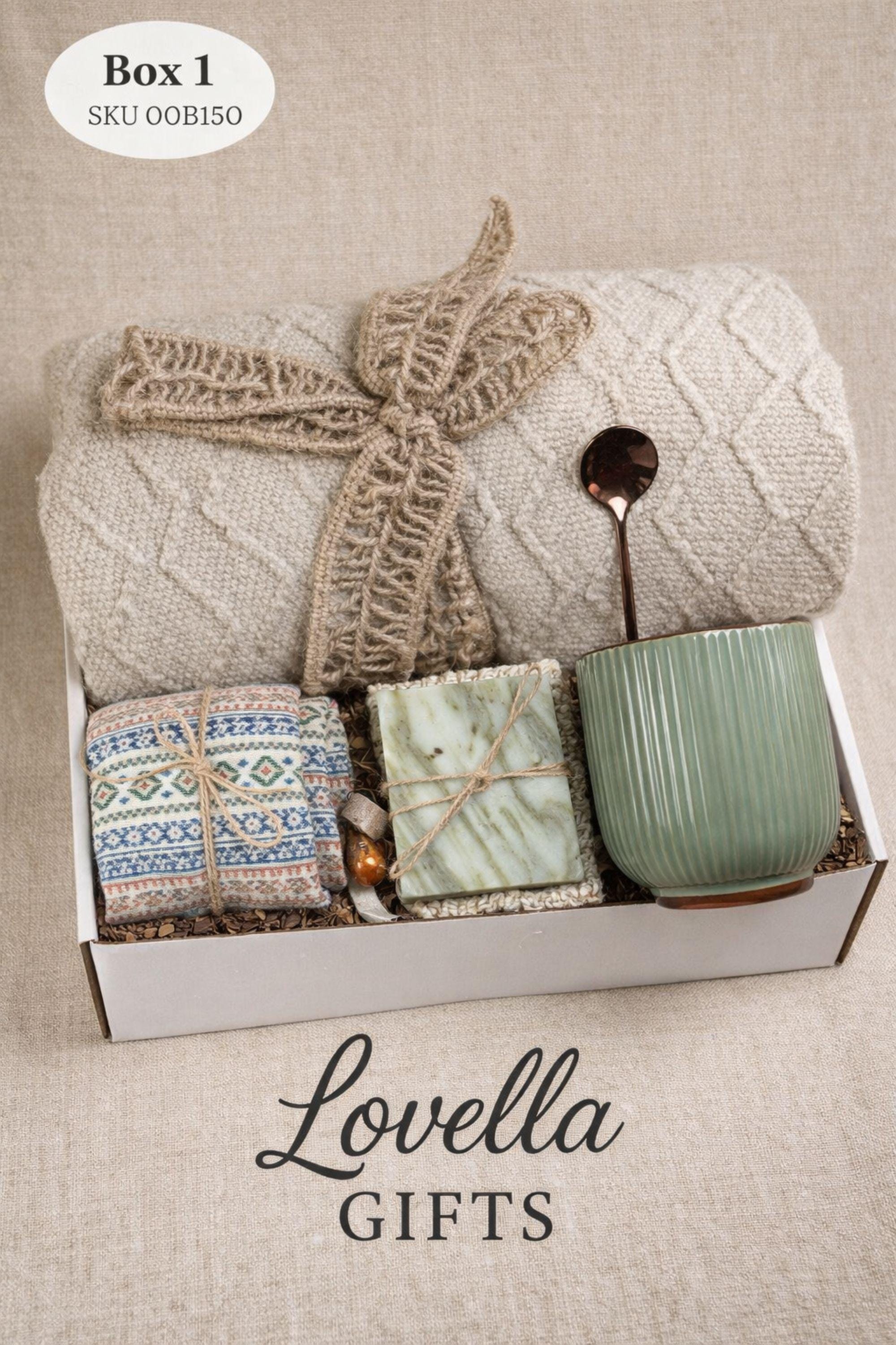 Get well soon gift box for her featuring cozy blanket, handmade soap, ceramic mug and spoon, comfort care package designed to help her feel better, thoughtful recovery gift for illness, cozy self care gift box for women, relaxing wellness gift, support gift for friend or coworker, thinking of you gift, ready to gift comfort package for rest, warmth and emotional care