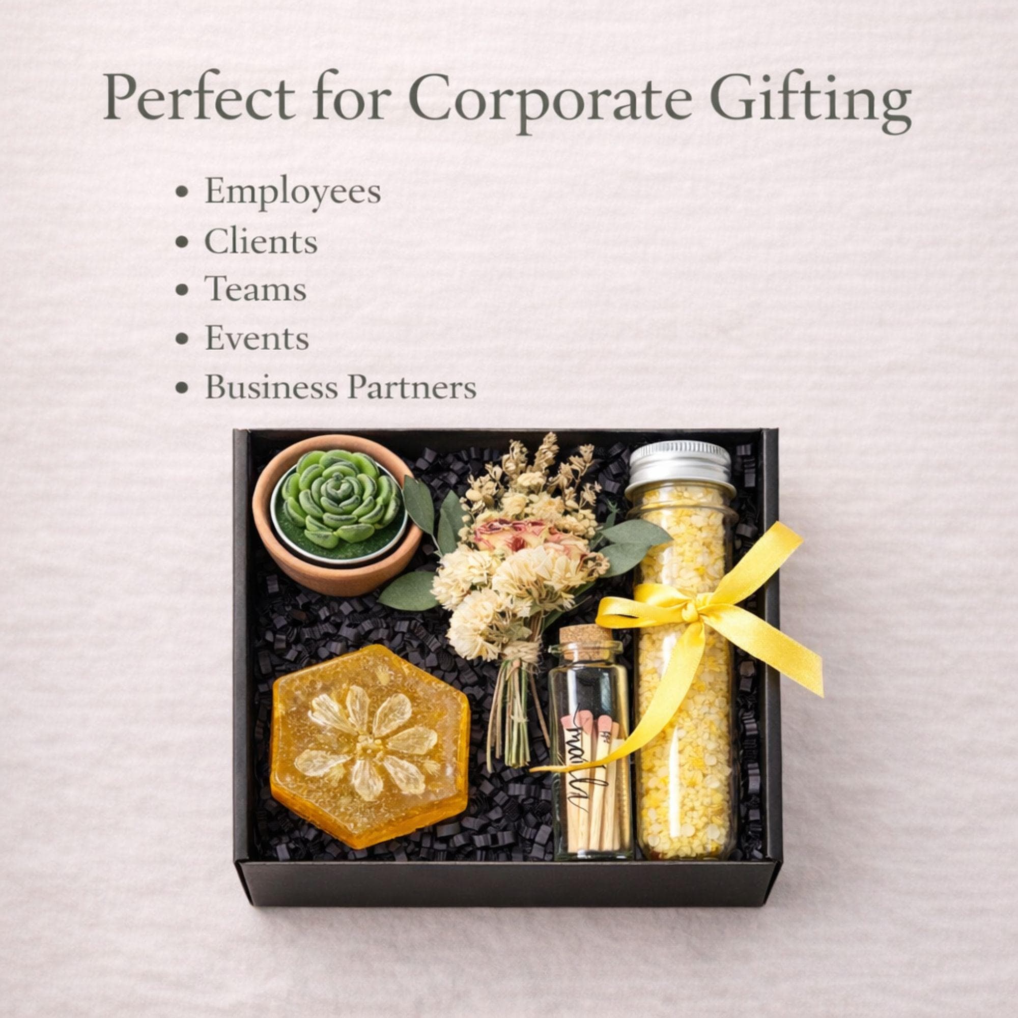 Corporate gift box for employee appreciation and client thank you gifting featuring handmade candle, bath salts, artisan soap, matches and dried flowers in elegant black box with yellow ribbon, compact 6x6 inch business gift set perfect for bulk corporate orders, office gifting, team appreciation, professional relationships and direct shipping to recipients