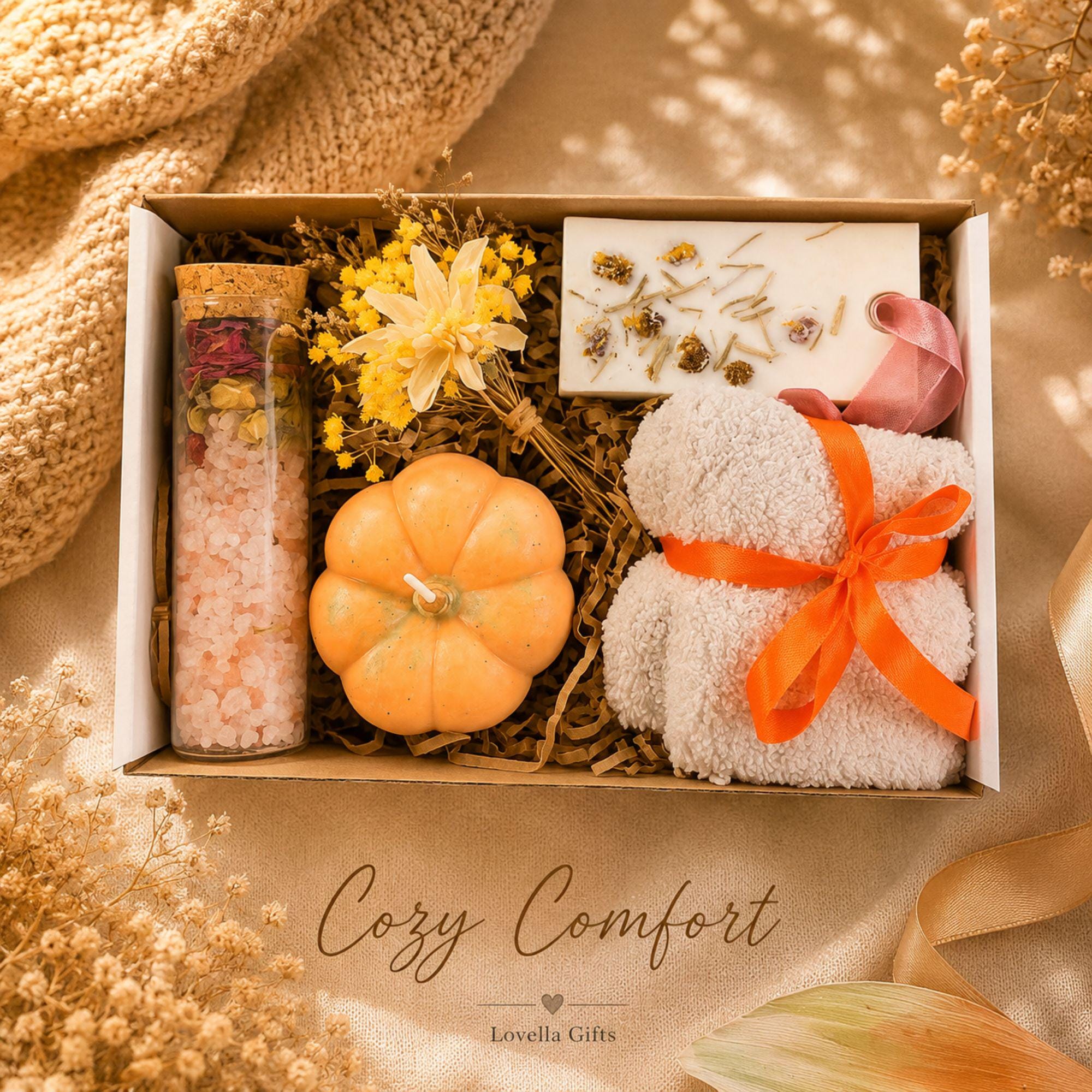 Thanksgiving gift box for women featuring a cozy knit blanket, handmade pumpkin soy candle, ceramic mug, artisan soap, decorative glass match bottle, plush teddy bear and cozy autumn socks in boutique gift packaging. Thanksgiving hostess gift basket perfect for hostess appreciation, thank you gifts, fall care packages, cozy blanket gifts, autumn self care, holiday gatherings, and seasonal gifts for mom, grandma, sister, friend, teacher or coworker.