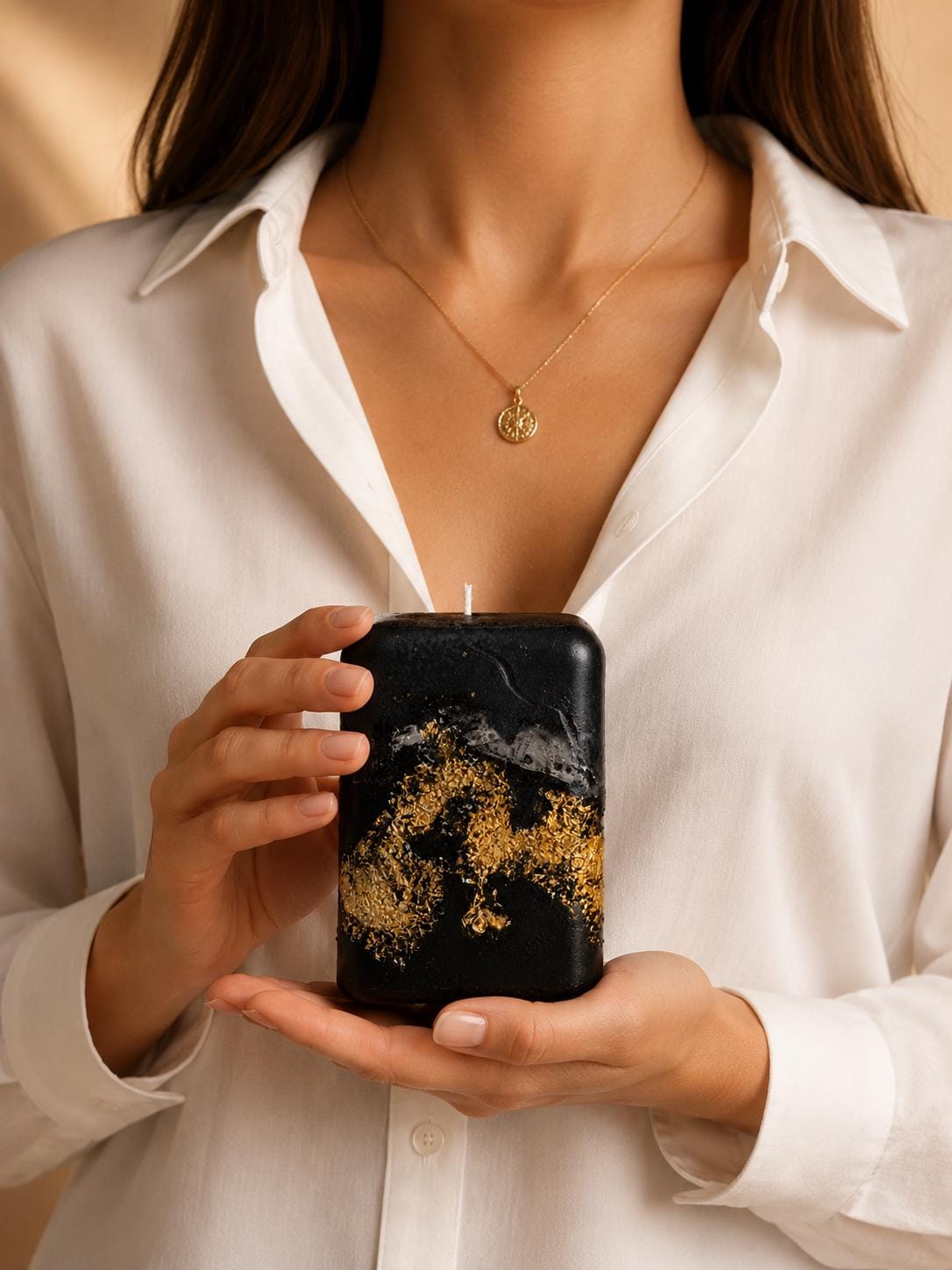 Black Gold Decorative Candle handmade luxury candle with gold leaf accents, sculptural black design, modern coffee table decor, and elegant housewarming gift styling.