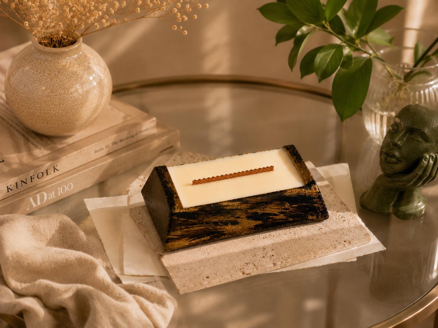 Luxury Decorative Candle - image 10 showing black gold artisan candle, ivory wax, wood wick, and elegant home decor styling. Modern Wood Wick Candle for housewarming gifts, coffee table decor, and luxury home styling.