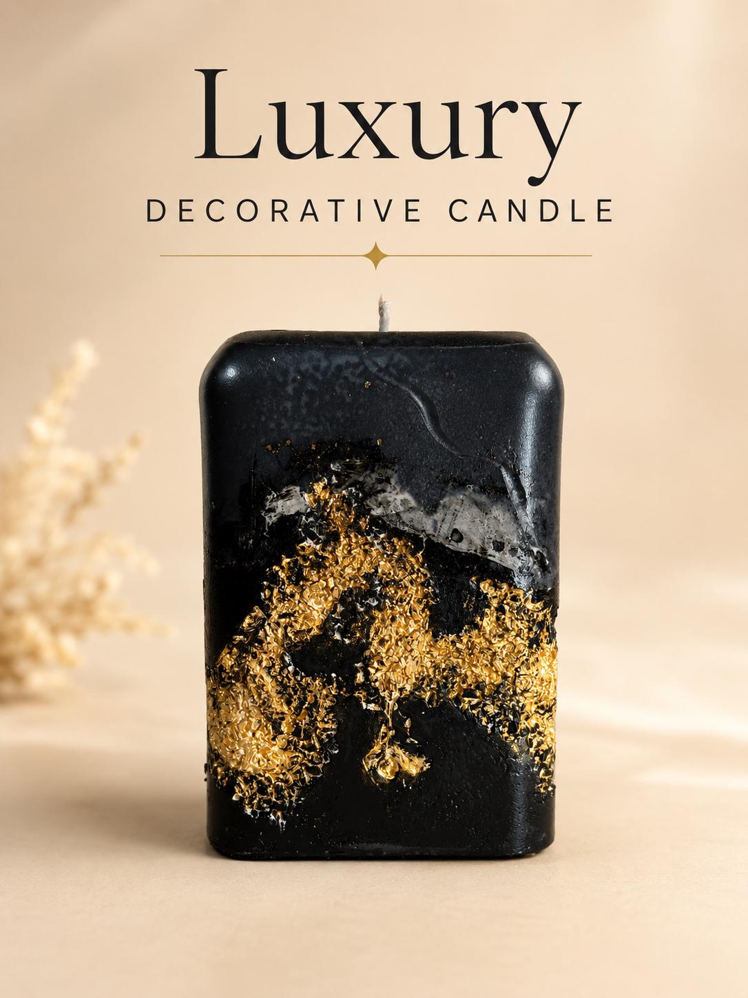 Black Gold Decorative Candle handmade luxury candle with gold leaf accents, sculptural black design, modern coffee table decor, and elegant housewarming gift styling.