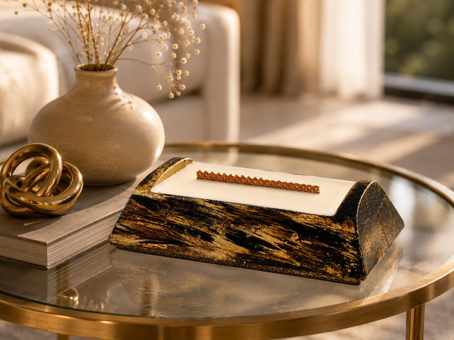 Luxury Decorative Candle - image 1 showing black gold artisan candle, ivory wax, wood wick, and elegant home decor styling. Modern Wood Wick Candle for housewarming gifts, coffee table decor, and luxury home styling.