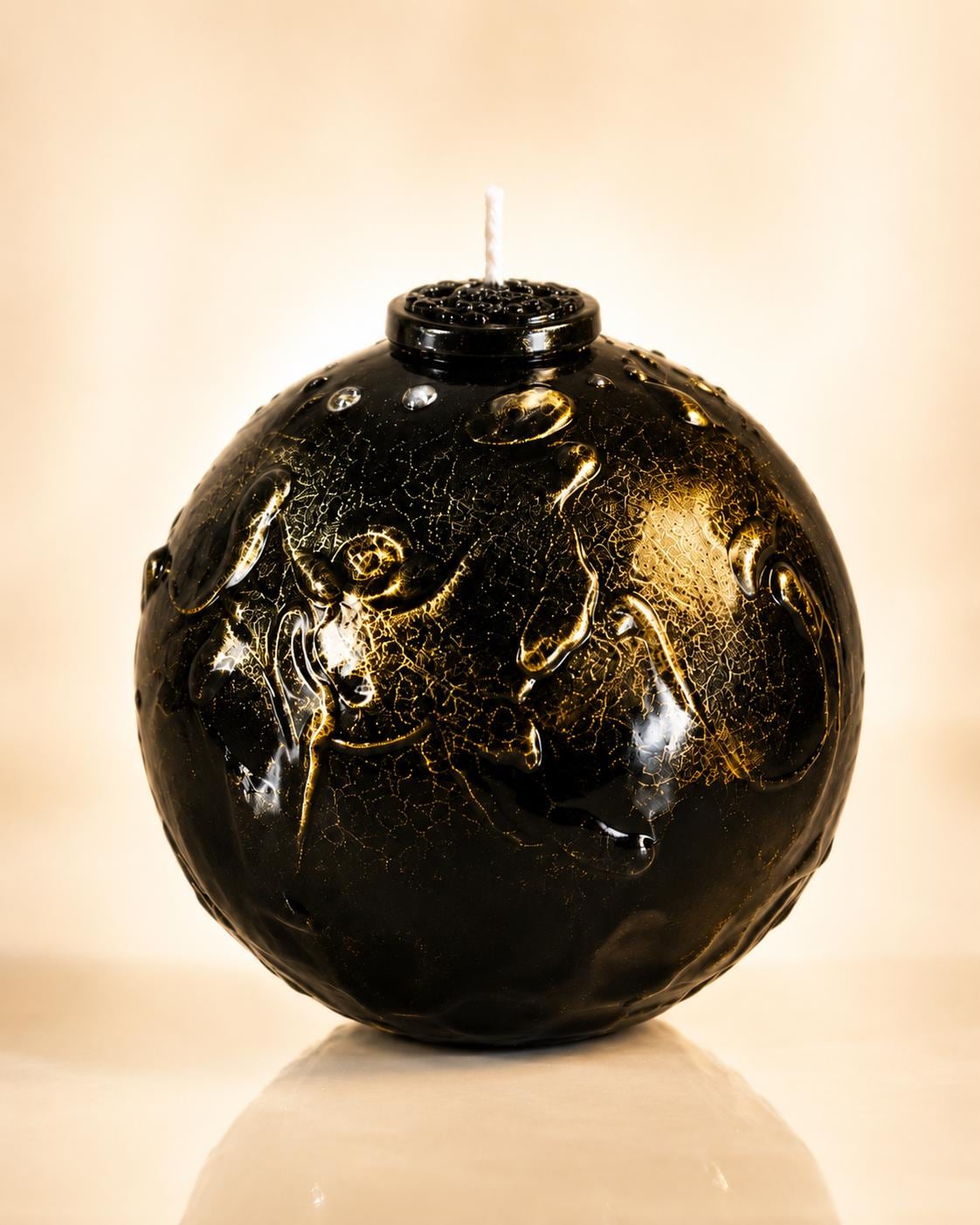Luxury Black & Gold Sphere Candle handmade decorative candle for gothic decor, modern home decor, sculptural wax art, and housewarming gift. Product image 1.