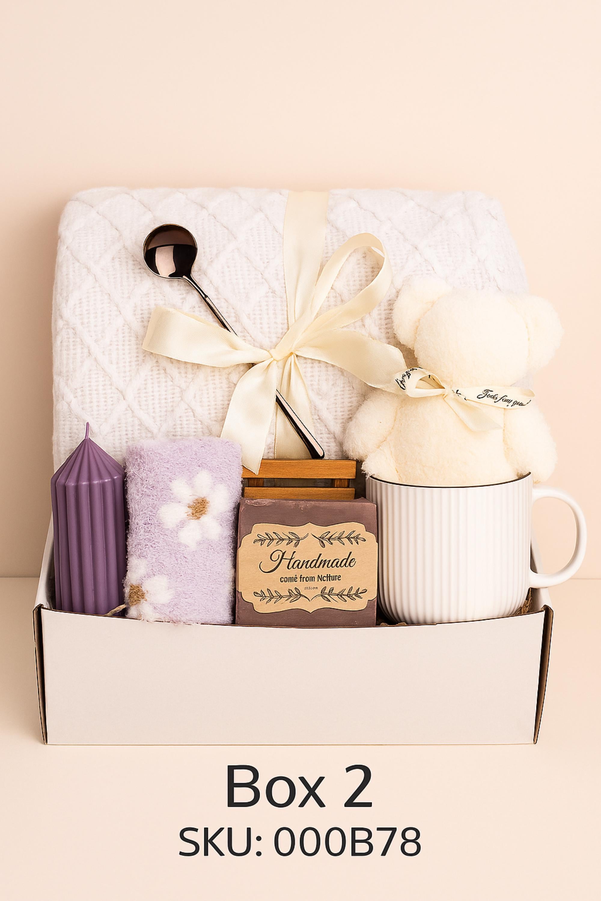 Sending hugs gift box for women featuring cozy blanket, mug, handmade soap and comfort items, designed as a sympathy care package to provide emotional support and warmth, neutral aesthetic ready to gift for grief, encouragement and thinking of you moments