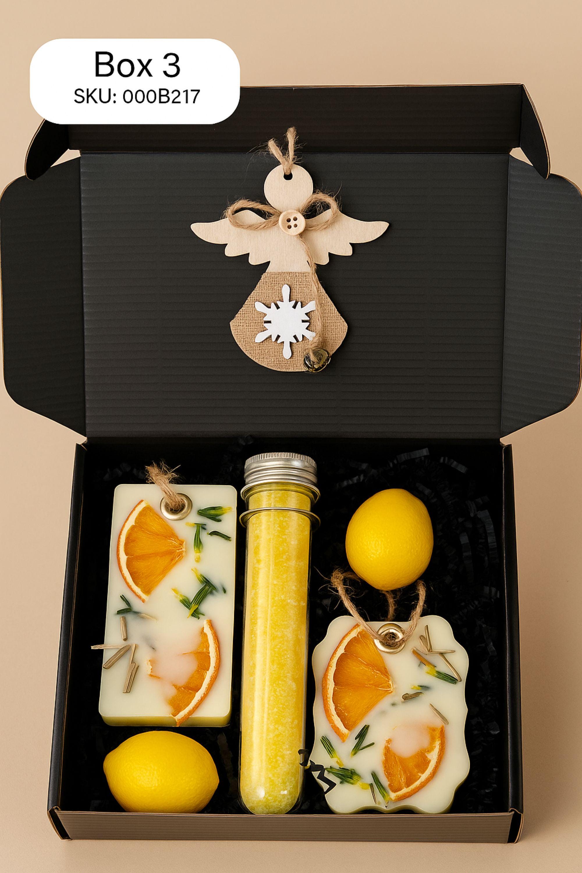 Christmas spa gift box for her with handmade soap, yellow bath bomb, citrus wax sachet, towel teddy bear, angel ornament, and aromatic bath salts. Cozy holiday self-care package for women, small Christmas gift, Secret Santa spa set, relaxation and pampering box for winter stress relief.
