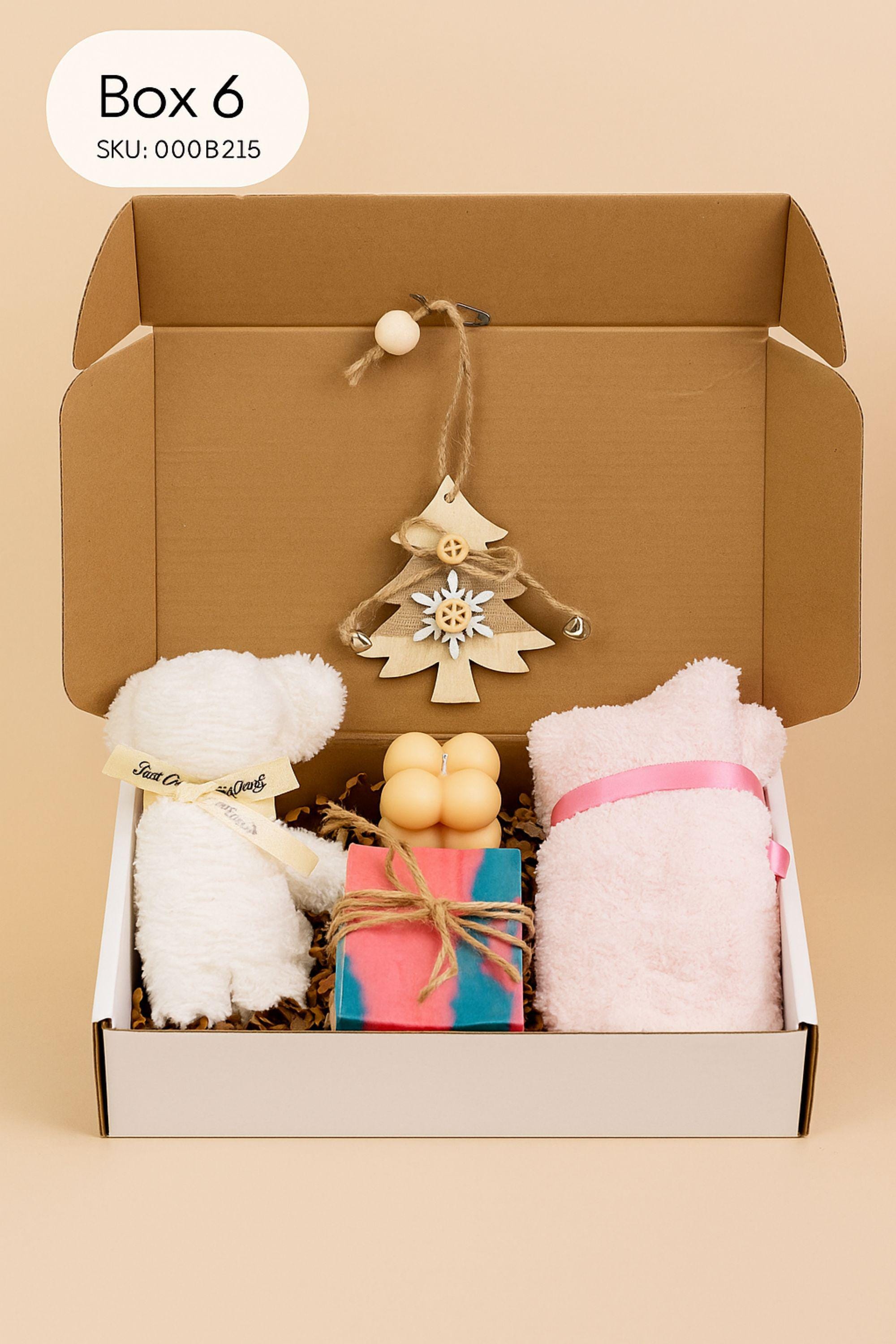 Christmas spa gift box for her with handmade soap, yellow bath bomb, citrus wax sachet, towel teddy bear, angel ornament, and aromatic bath salts. Cozy holiday self-care package for women, small Christmas gift, Secret Santa spa set, relaxation and pampering box for winter stress relief.