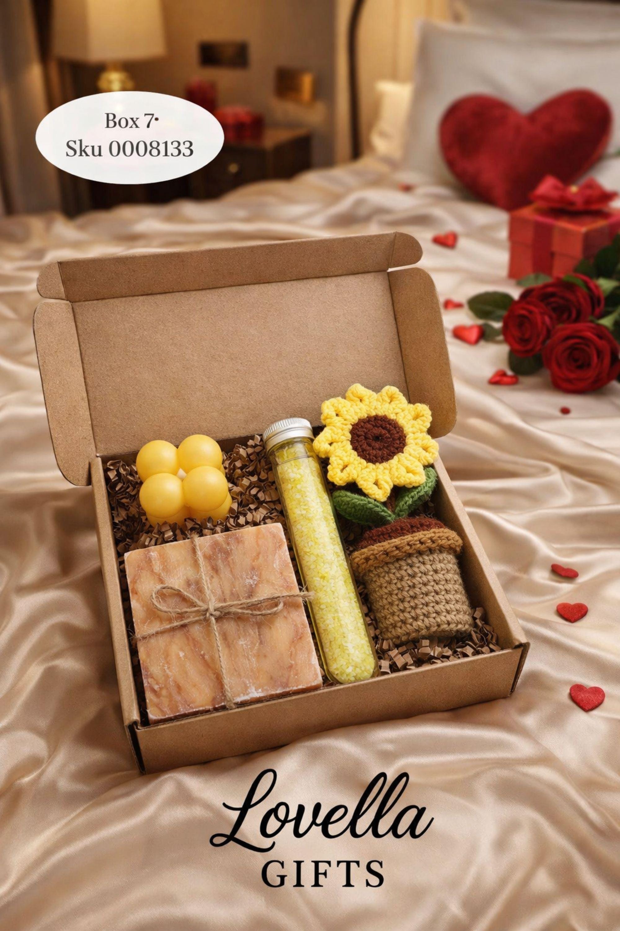 Self love Valentine spa gift box featuring two handmade bubble candles, artisan soap tied with twine, bath salts in glass tubes with ribbon, a crochet heart, and a decorative succulent in a gift box with shredded paper filler. Neutral and calming self care gift for women, ready to gift for Valentine’s Day, self love, thinking of you, or just because occasions. Handmade spa gift with cozy aesthetic.