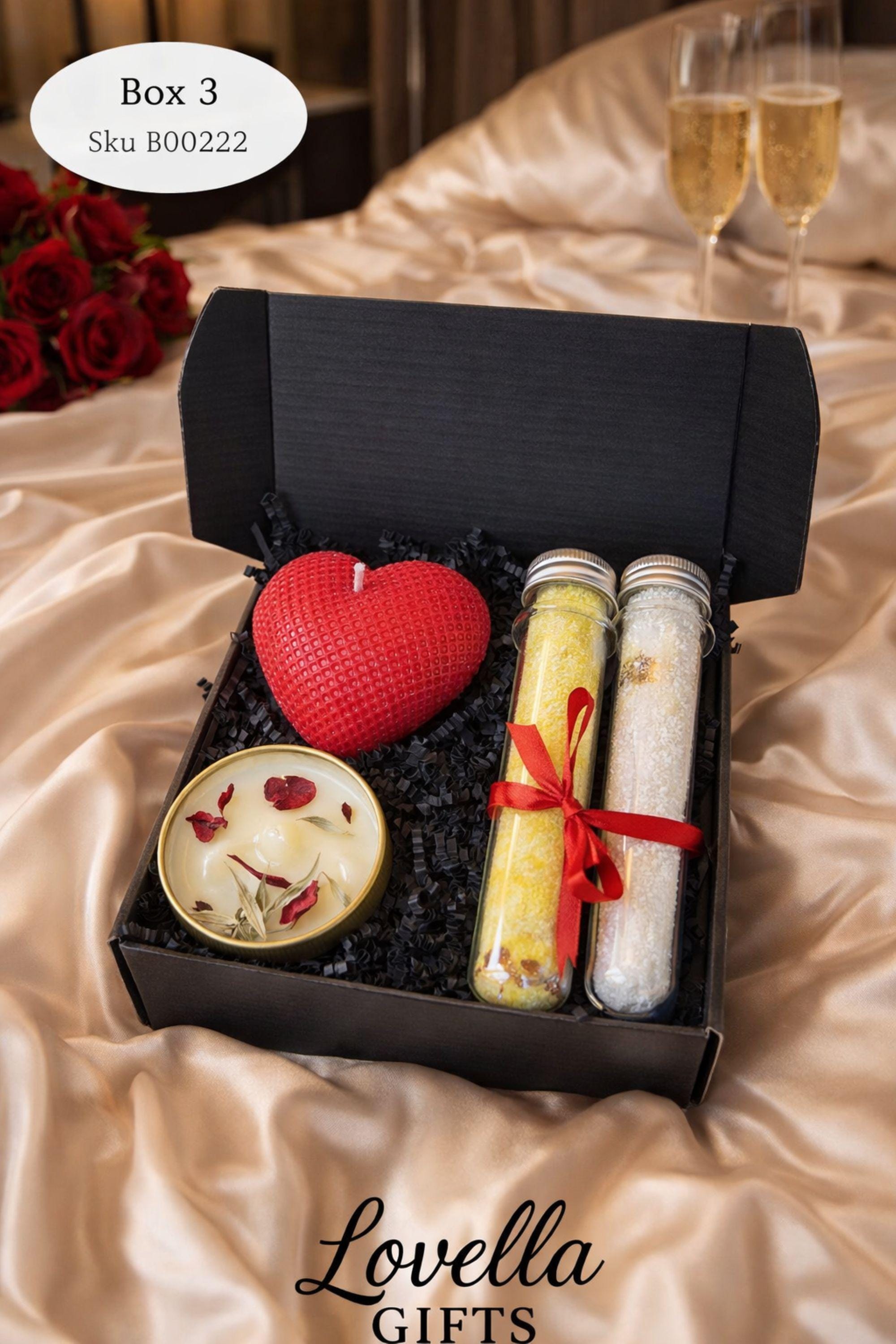 Cozy comfort gift box with handmade soap tied with red ribbon, natural candle in metal tin with dried petals, crocheted washcloth and leather cherry keychain arranged in a kraft box with eco filler. Thoughtful handmade care package perfect as a thinking of you gift, long distance gift, just because present or comforting cozy gift for her. Warm meaningful gift box designed to bring comfort, care and emotional warmth.