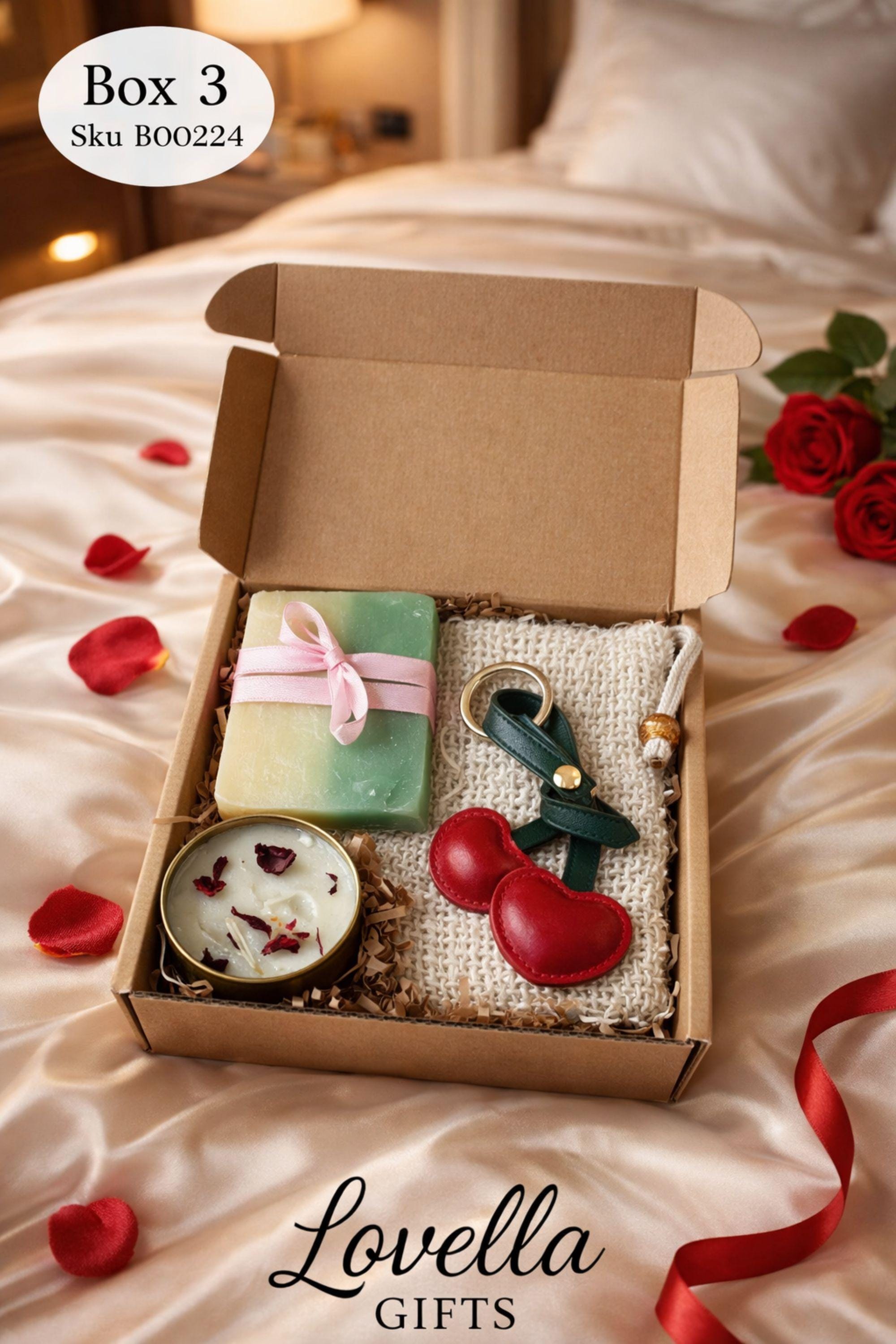 Valentine gift box for her displayed open in a kraft box, featuring handmade sage bubble candles, natural soap tied with a soft ribbon, and two glass tubes of bath salts arranged neatly with filler. Calm Valentine care package designed in soothing green and neutral tones, perfect as a gentle handmade Valentine gift, comfort box, or thoughtful alternative to traditional romantic presents.