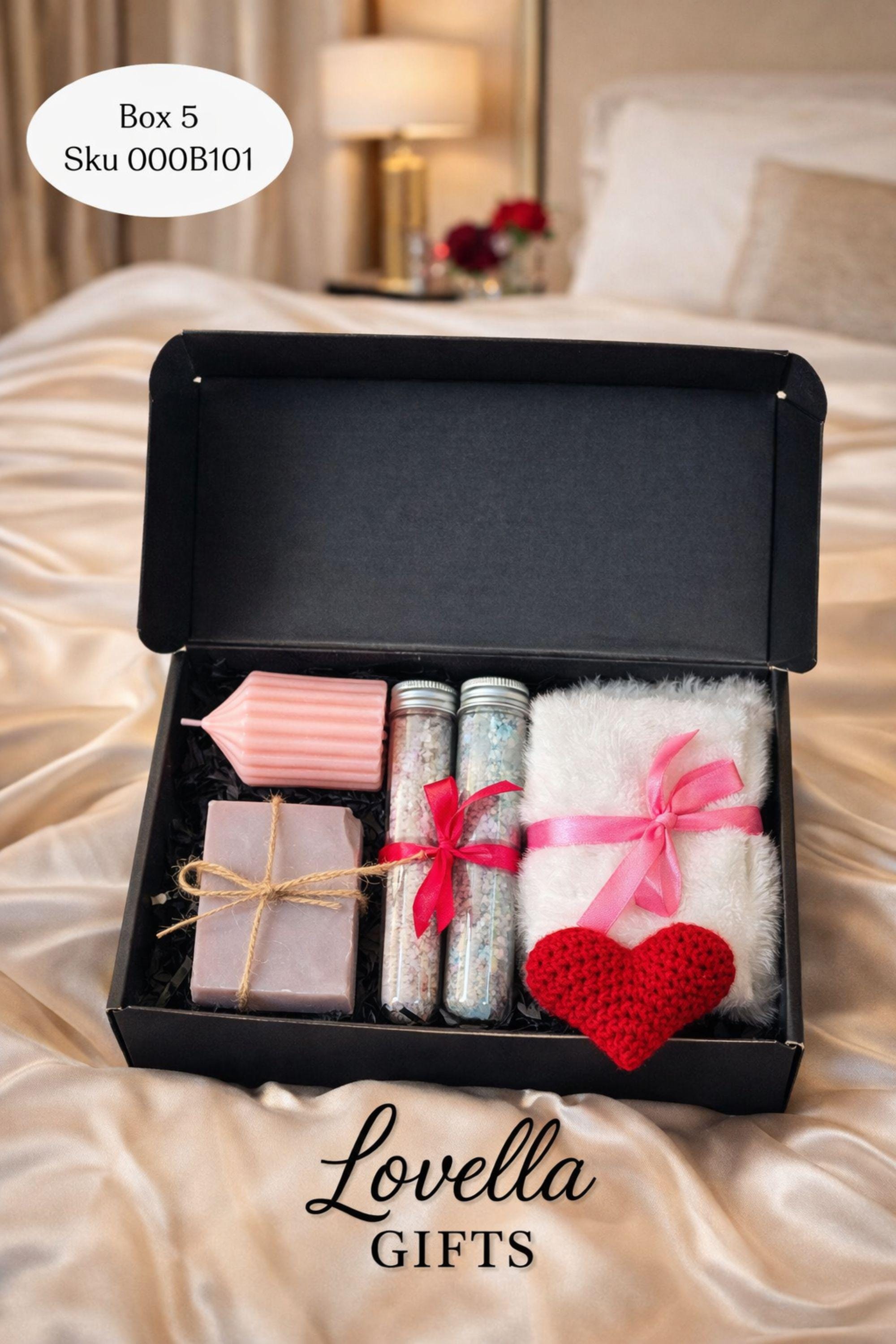 Self love Valentine spa gift box featuring two handmade bubble candles, artisan soap tied with twine, bath salts in glass tubes with ribbon, a crochet heart, and a decorative succulent in a gift box with shredded paper filler. Neutral and calming self care gift for women, ready to gift for Valentine’s Day, self love, thinking of you, or just because occasions. Handmade spa gift with cozy aesthetic.