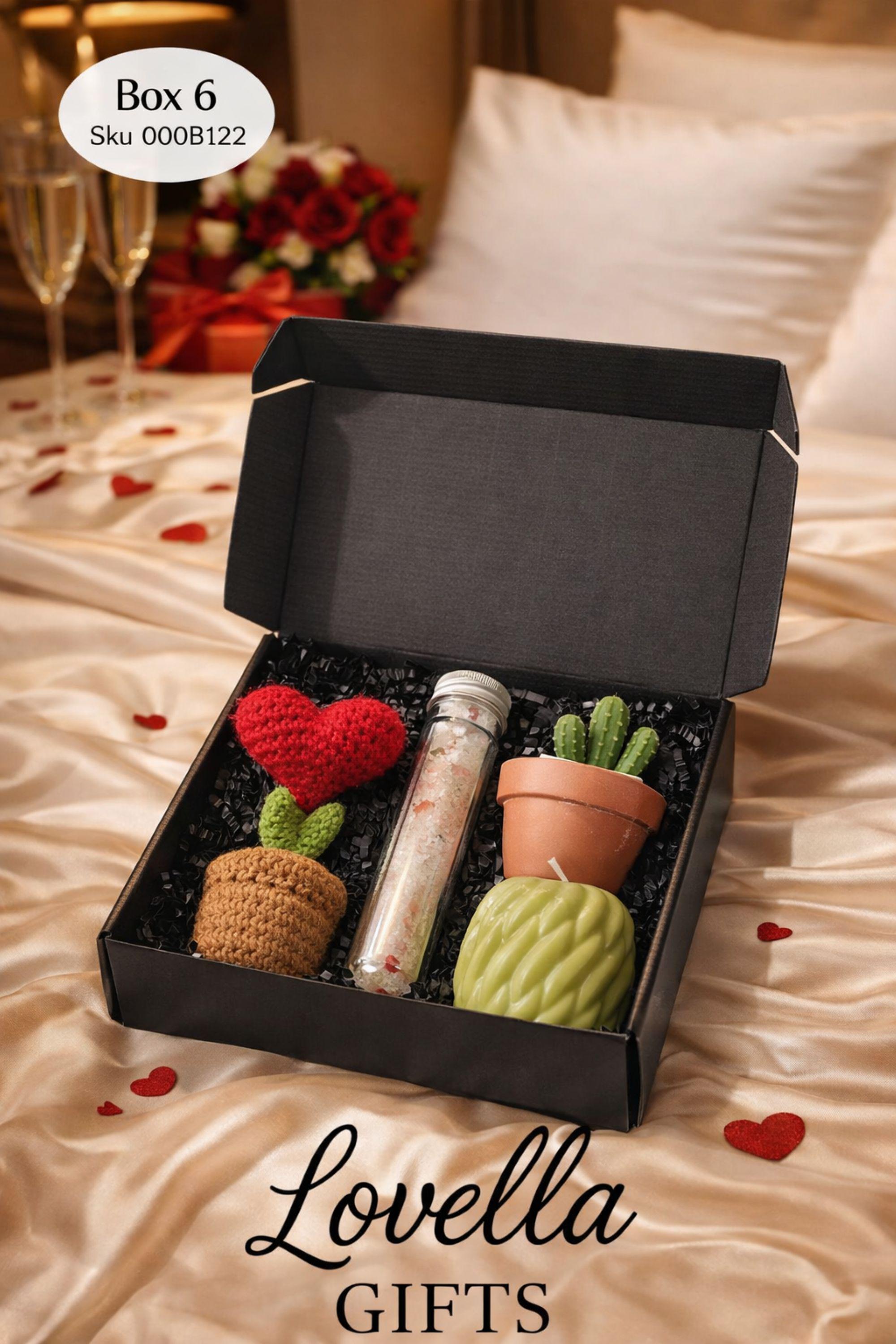 Self love Valentine spa gift box featuring two handmade bubble candles, artisan soap tied with twine, bath salts in glass tubes with ribbon, a crochet heart, and a decorative succulent in a gift box with shredded paper filler. Neutral and calming self care gift for women, ready to gift for Valentine’s Day, self love, thinking of you, or just because occasions. Handmade spa gift with cozy aesthetic.