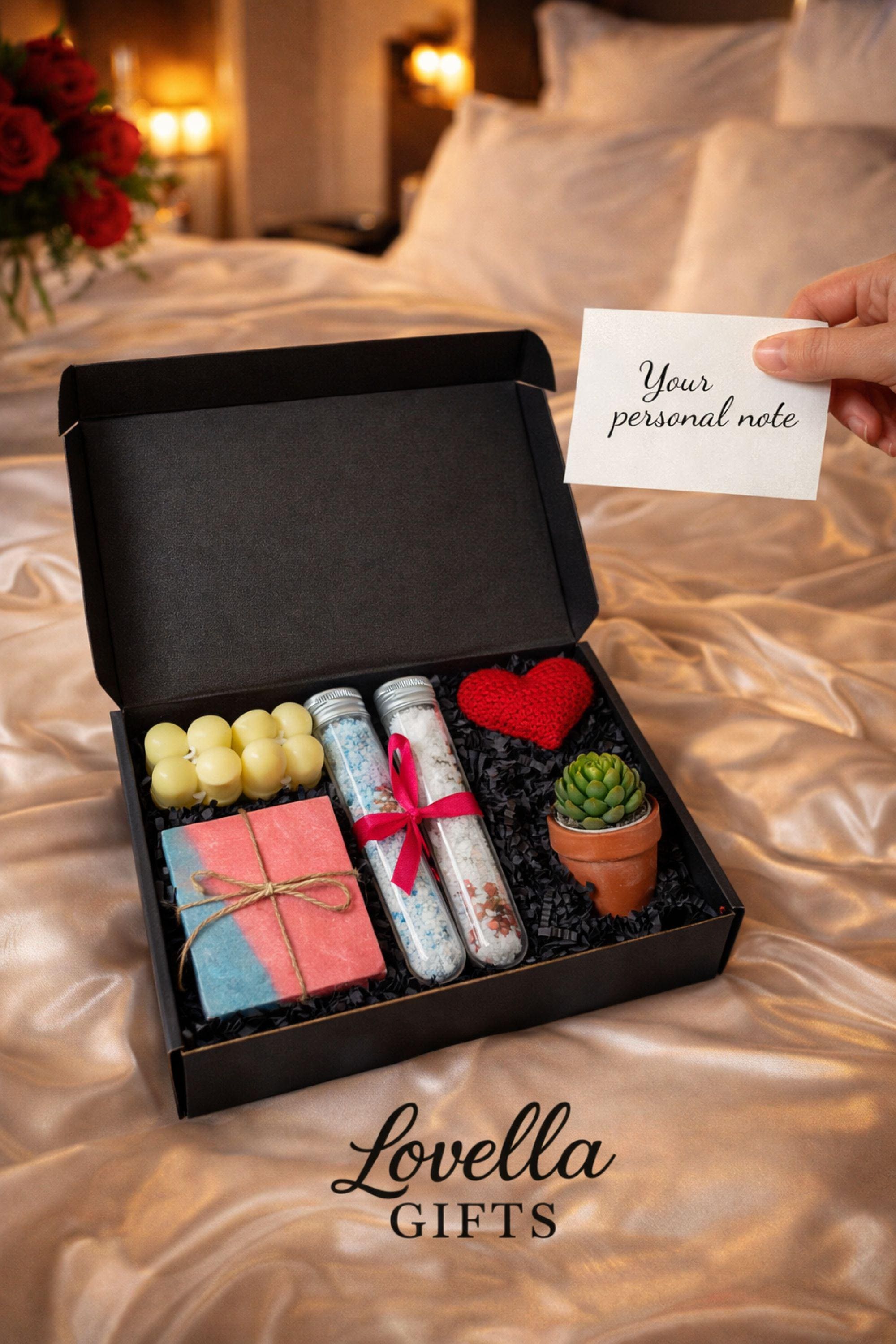 Self love Valentine spa gift box featuring two handmade bubble candles, artisan soap tied with twine, bath salts in glass tubes with ribbon, a crochet heart, and a decorative succulent in a gift box with shredded paper filler. Neutral and calming self care gift for women, ready to gift for Valentine’s Day, self love, thinking of you, or just because occasions. Handmade spa gift with cozy aesthetic.