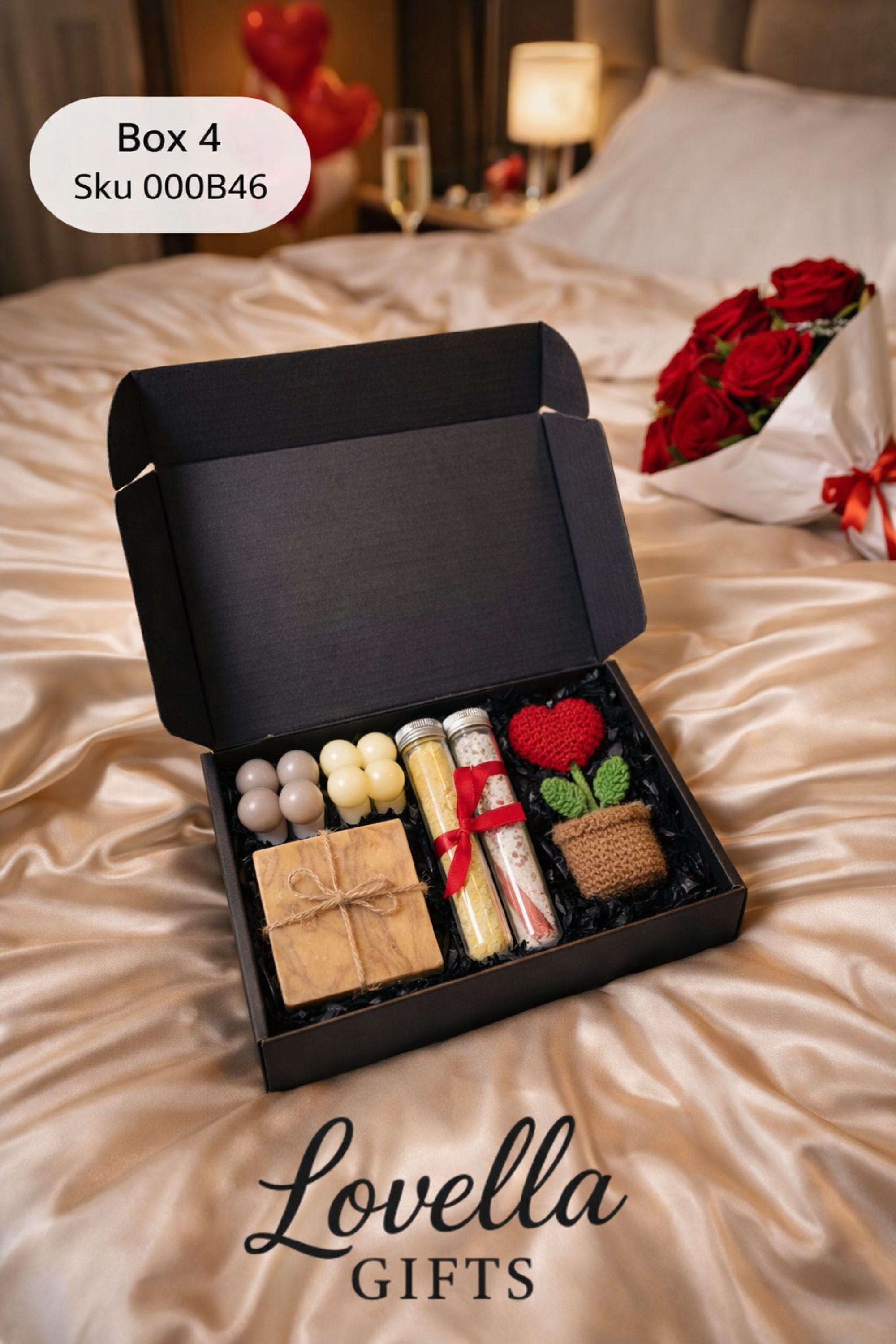 Valentine gift box for her displayed open in a kraft box, featuring handmade sage bubble candles, natural soap tied with a soft ribbon, and two glass tubes of bath salts arranged neatly with filler. Calm Valentine care package designed in soothing green and neutral tones, perfect as a gentle handmade Valentine gift, comfort box, or thoughtful alternative to traditional romantic presents.