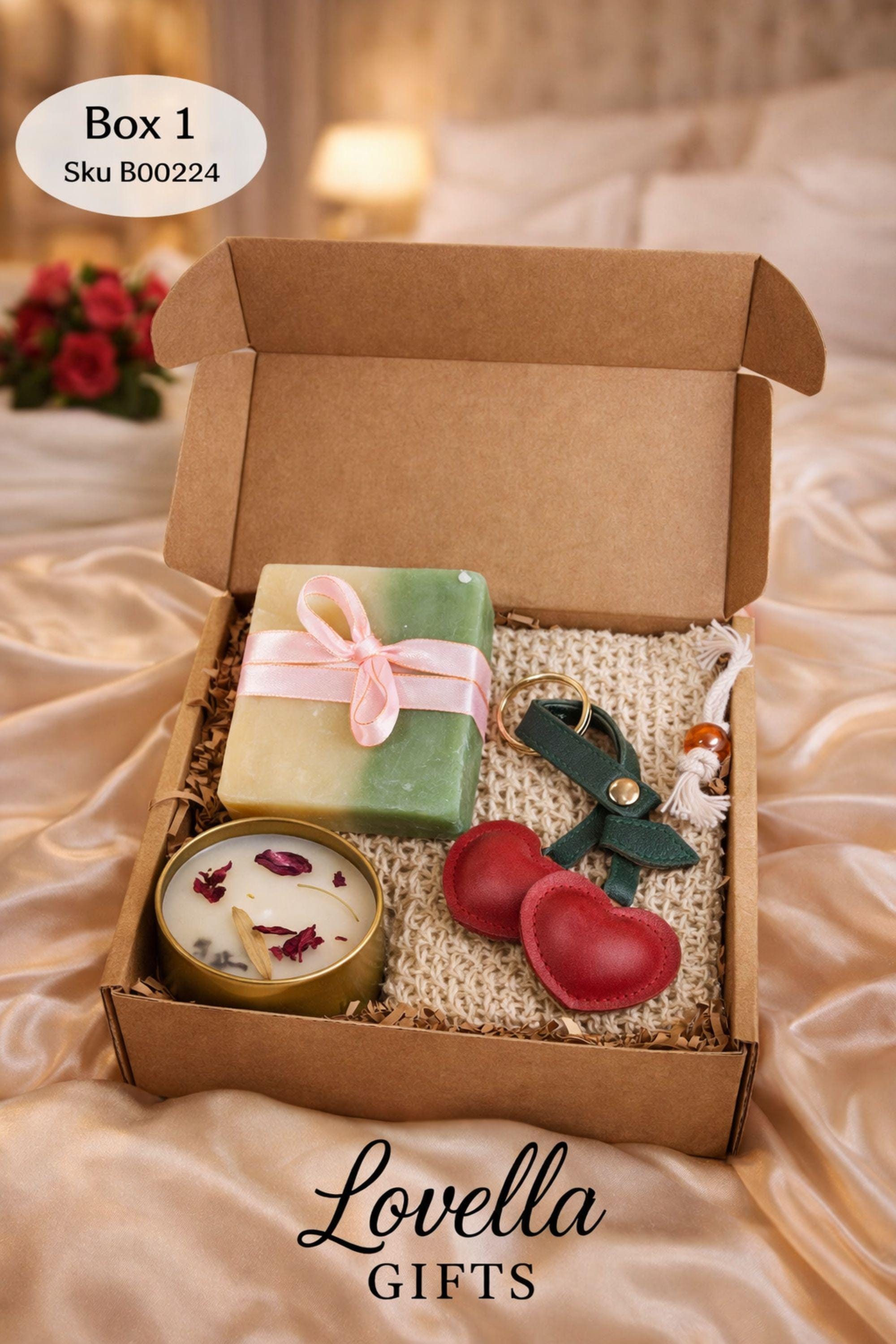 Valentine’s Day thinking of you gift box with handmade soap, botanical candle, crochet washcloth, and leather cherry keychain arranged in a kraft gift box. Cozy Valentine care package featuring artisan soap tied with ribbon, floral candle in tin, soft eco washcloth, and charming heart-inspired cherry accessory. Meaningful Valentine gift for her, long distance Valentine care package, or romantic handmade Valentine present ready to gift.