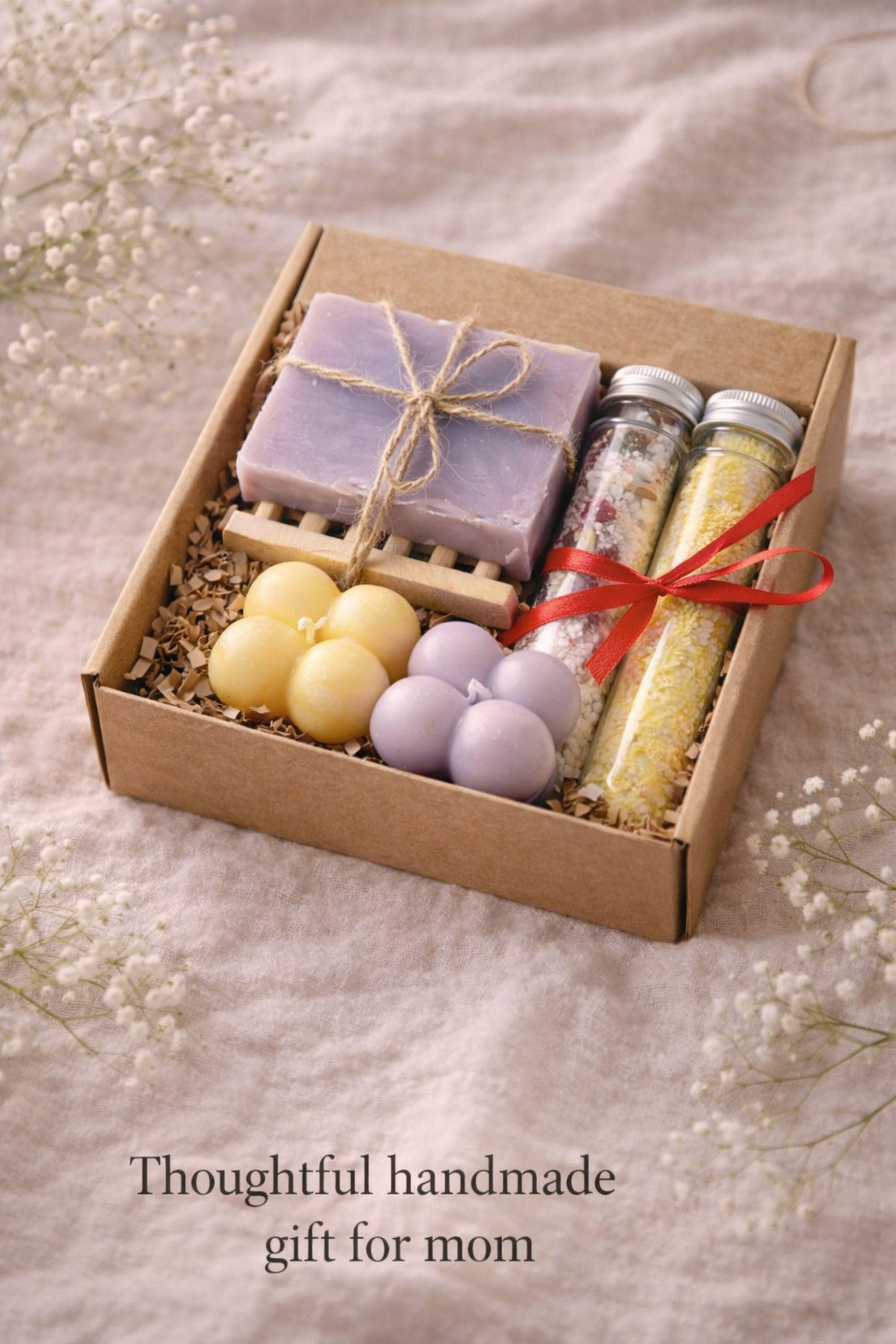 Open gift box for mom styled in warm natural light, featuring handmade bubble candles, natural soap, and bath salts arranged neatly inside a small kraft box. Calm and cozy presentation designed to reassure buyers that this handmade gift for mom feels thoughtful, warm, and easy to enjoy.