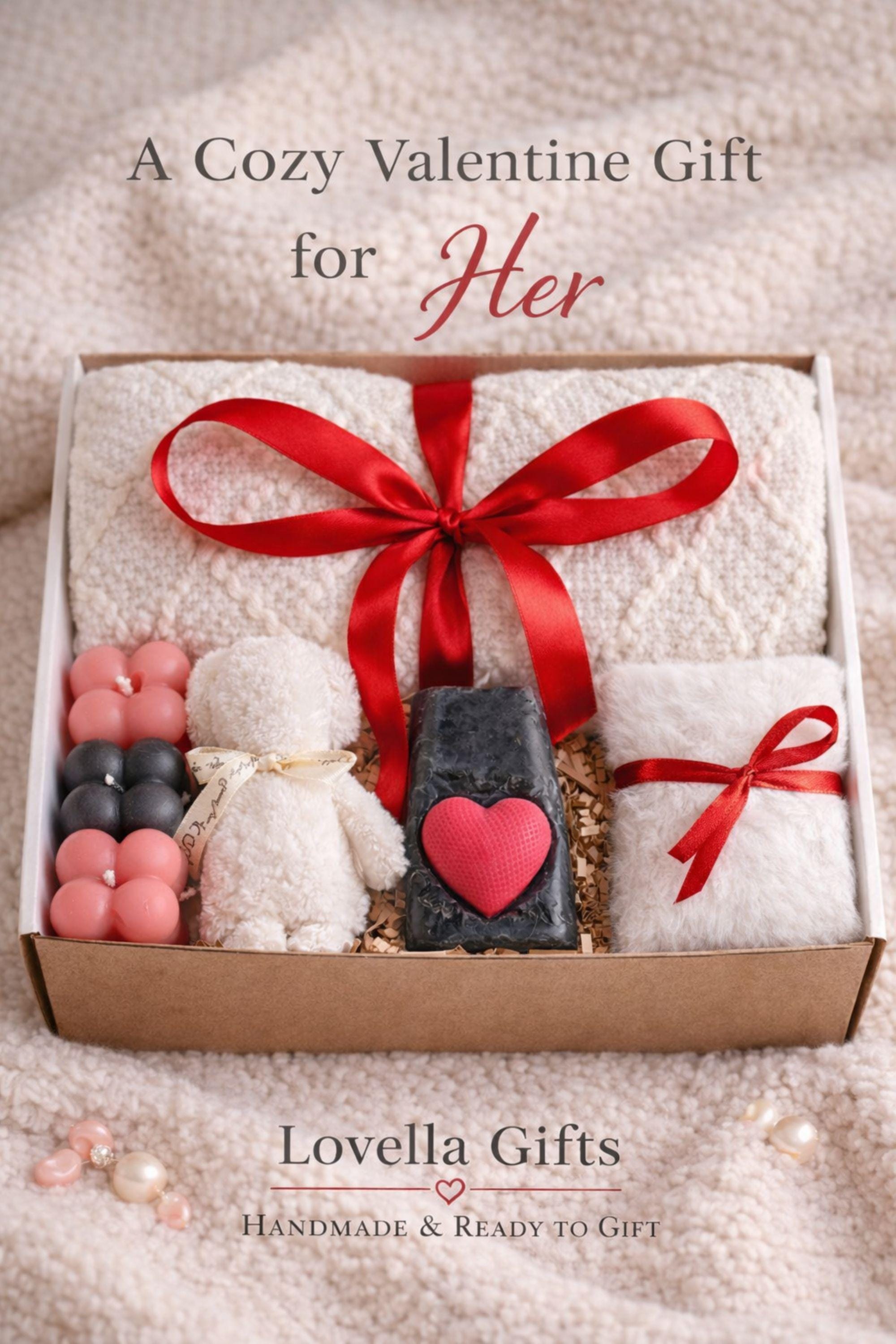 Cozy Valentine gift box for her displayed on a soft cream knitted background, featuring handmade bubble candles, a heart-shaped artisan soap, plush cozy bear, and spa-inspired self care items arranged in a gift-ready box. This romantic Valentine care package is a thoughtful self care gift for girlfriend, wife, sister, or loved one, designed to send comfort, warmth, and love with handmade details and ready-to-gift packaging.