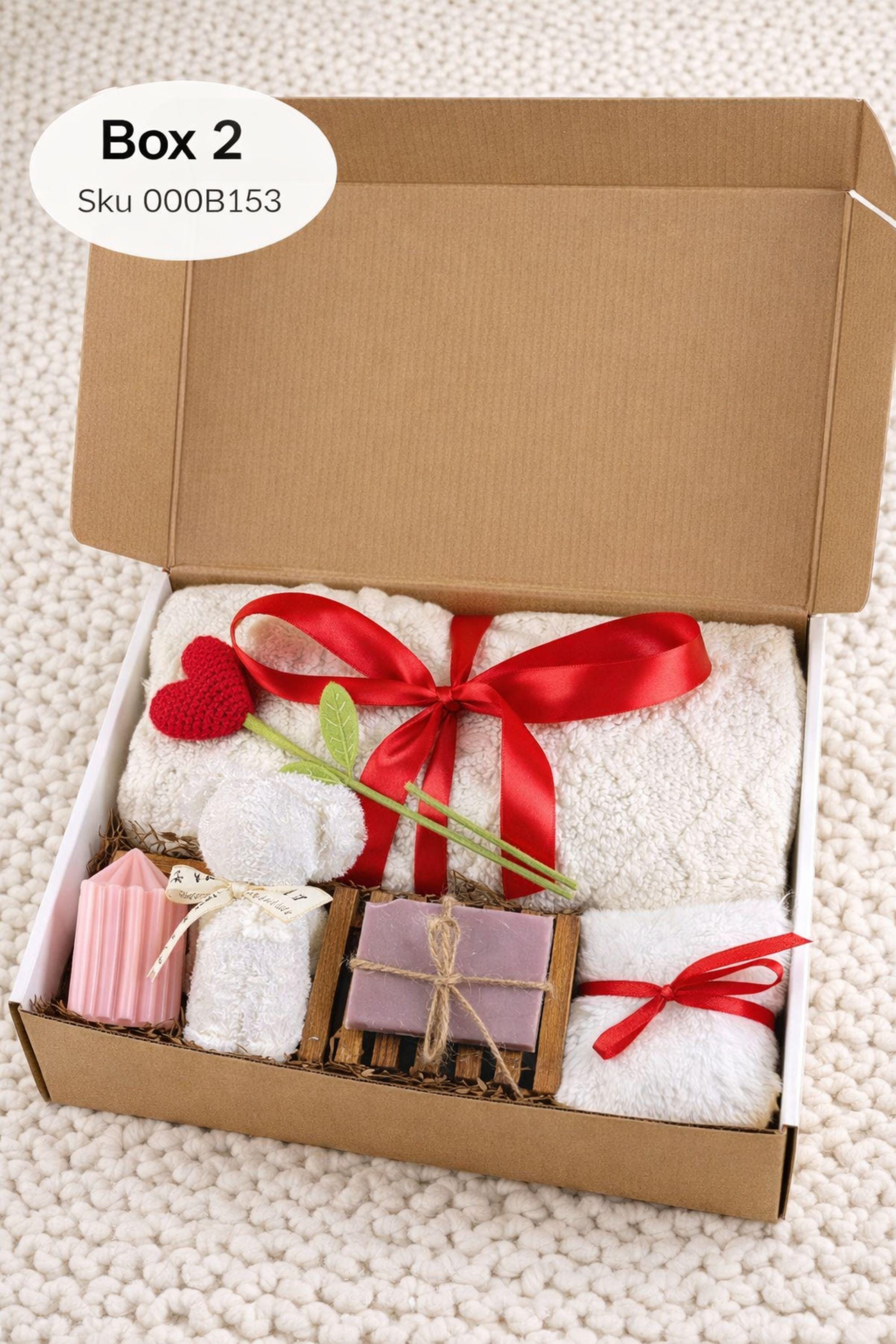 Cozy Valentine gift box for her displayed on a soft cream knitted background, featuring handmade bubble candles, a heart-shaped artisan soap, plush cozy bear, and spa-inspired self care items arranged in a gift-ready box. This romantic Valentine care package is a thoughtful self care gift for girlfriend, wife, sister, or loved one, designed to send comfort, warmth, and love with handmade details and ready-to-gift packaging.