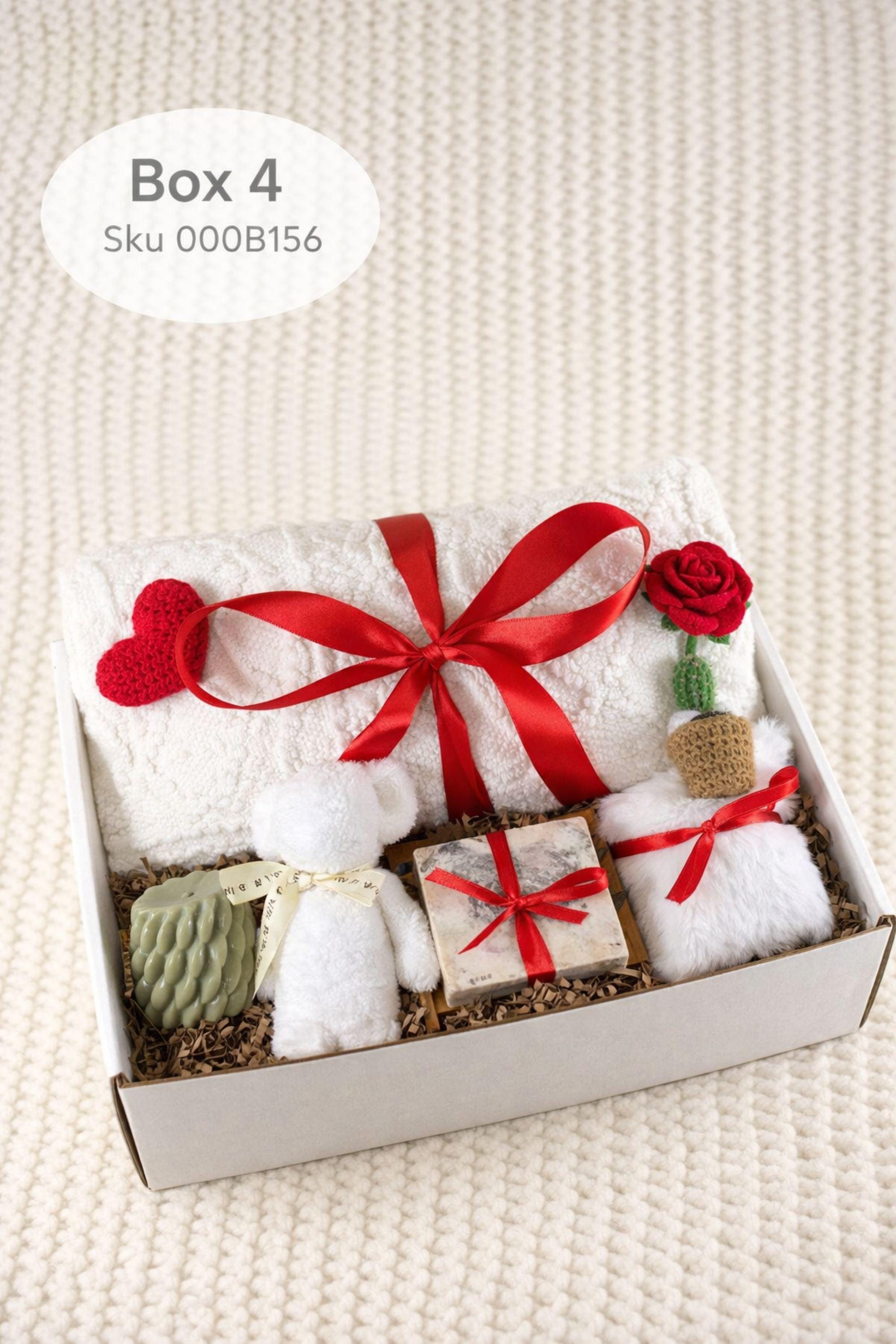 Cozy Valentine gift box for her displayed on a soft cream knitted background, featuring handmade bubble candles, a heart-shaped artisan soap, plush cozy bear, and spa-inspired self care items arranged in a gift-ready box. This romantic Valentine care package is a thoughtful self care gift for girlfriend, wife, sister, or loved one, designed to send comfort, warmth, and love with handmade details and ready-to-gift packaging.