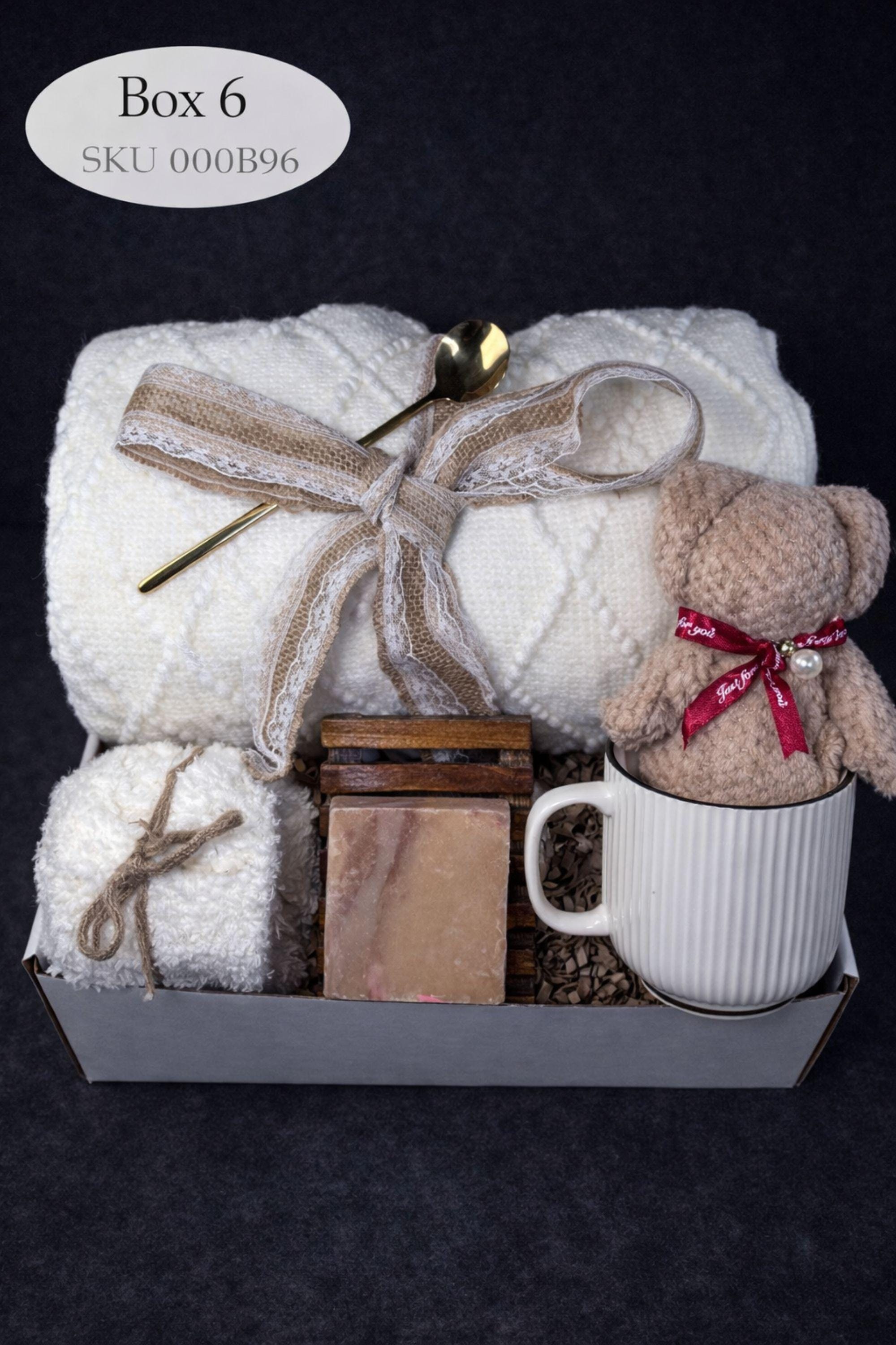 Loss of mother sympathy gift box with cozy blanket, mug, handmade soap, wooden tray, soft socks and comfort items arranged in kraft box. Bereavement care package for condolence support and memorial present. Thoughtful grief support gift for loss of mom, funeral comfort box, remembrance gesture sent directly to recipient. Elegant sympathy present designed to provide warmth and quiet comfort during difficult time.