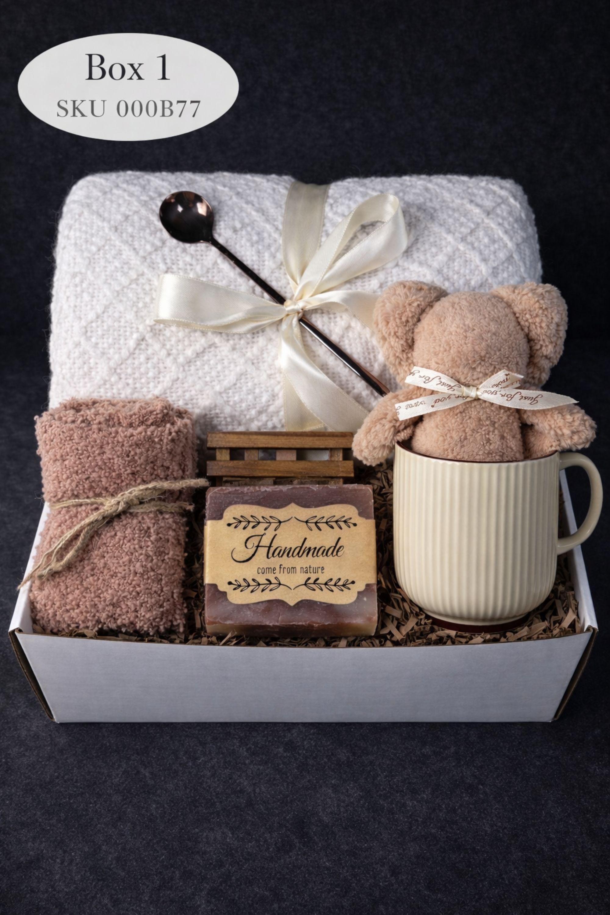 Loss of mother sympathy gift box with cozy blanket, mug, handmade soap, wooden tray, soft socks and comfort items arranged in kraft box. Bereavement care package for condolence support and memorial present. Thoughtful grief support gift for loss of mom, funeral comfort box, remembrance gesture sent directly to recipient. Elegant sympathy present designed to provide warmth and quiet comfort during difficult time.