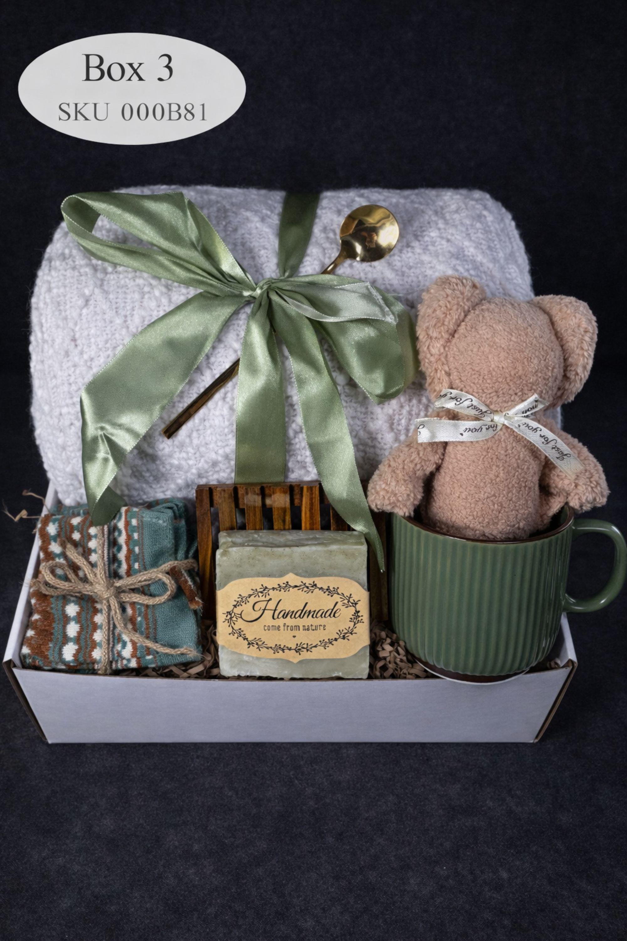 Loss of mother sympathy gift box with cozy blanket, mug, handmade soap, wooden tray, soft socks and comfort items arranged in kraft box. Bereavement care package for condolence support and memorial present. Thoughtful grief support gift for loss of mom, funeral comfort box, remembrance gesture sent directly to recipient. Elegant sympathy present designed to provide warmth and quiet comfort during difficult time.