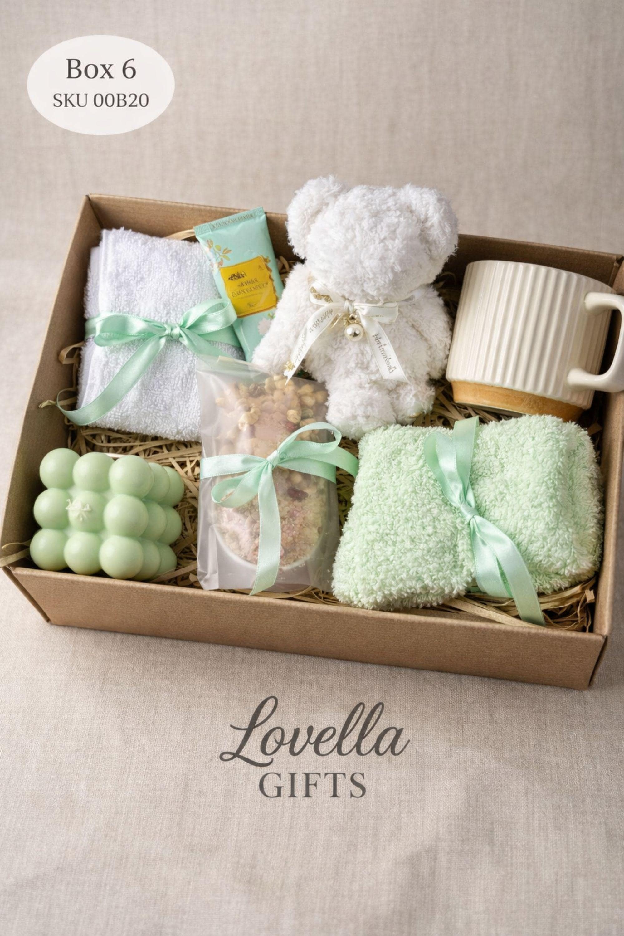 Get well soon gift box for her featuring cozy blanket, handmade soap, ceramic mug and spoon, comfort care package designed to help her feel better, thoughtful recovery gift for illness, cozy self care gift box for women, relaxing wellness gift, support gift for friend or coworker, thinking of you gift, ready to gift comfort package for rest, warmth and emotional care