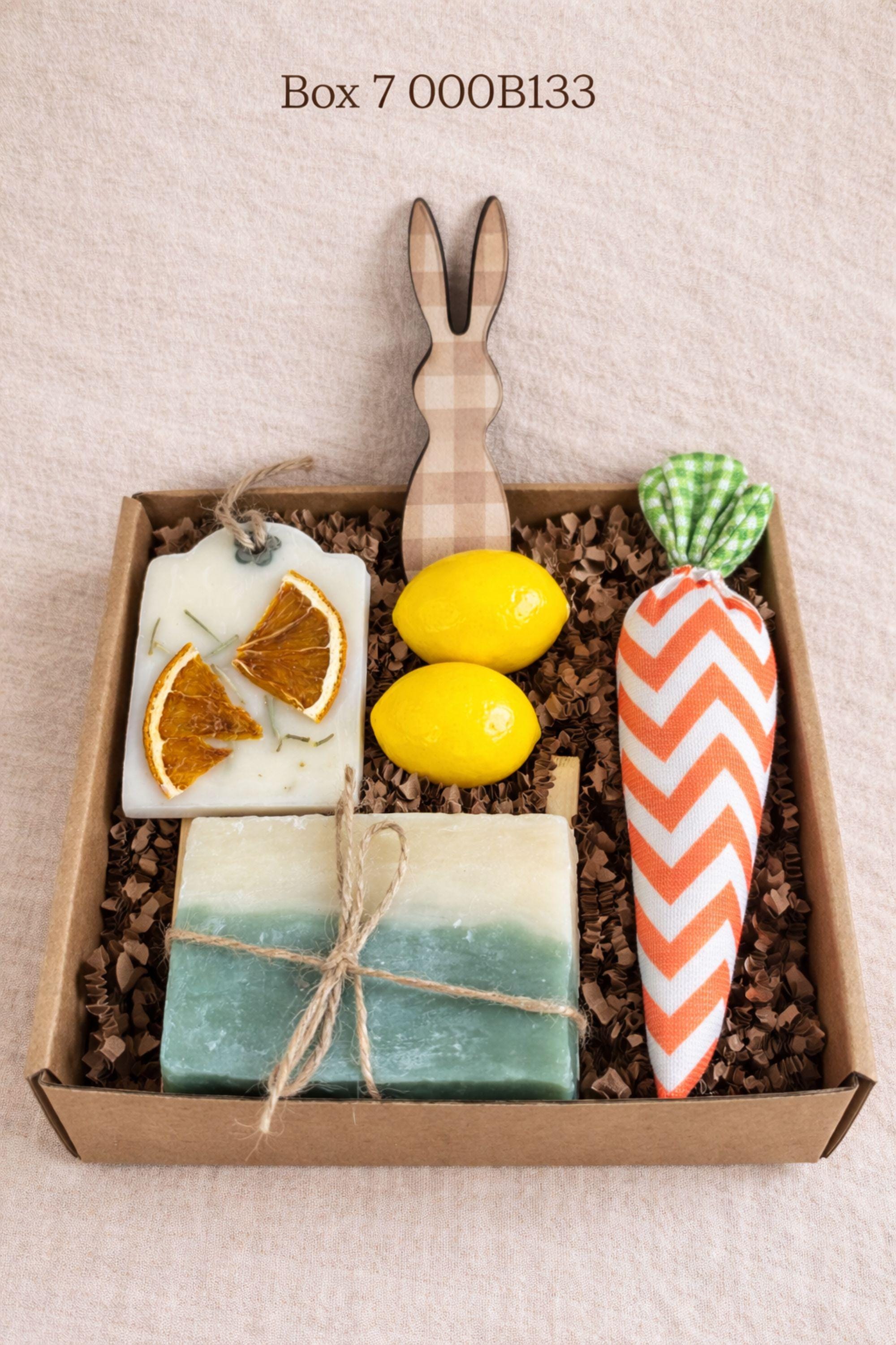small easter gift box with wooden bunny decoration, crochet sunflower in pot, handmade botanical wax sachet, mini easter basket with eggs, soft neutral cloth wrapped with twine, colorful paper filler, spring themed gift box for women, ready to gift easter care package, cozy handmade spring gift set, pastel aesthetic small gift box