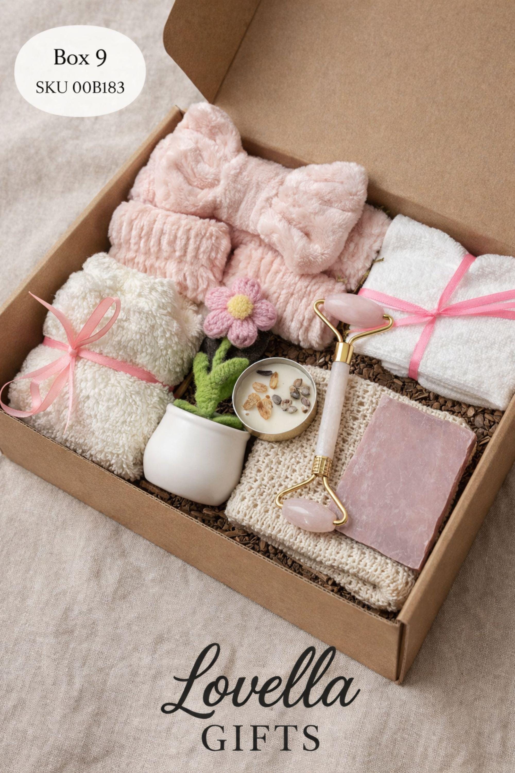 Breakup comfort gift box with cozy blanket, ceramic mug with gold spoon, plush teddy bear, handmade soap and face cloth arranged in gift box. Emotional support care package designed as a healing self care gift and thinking of you gift for friend going through breakup or difficult time.