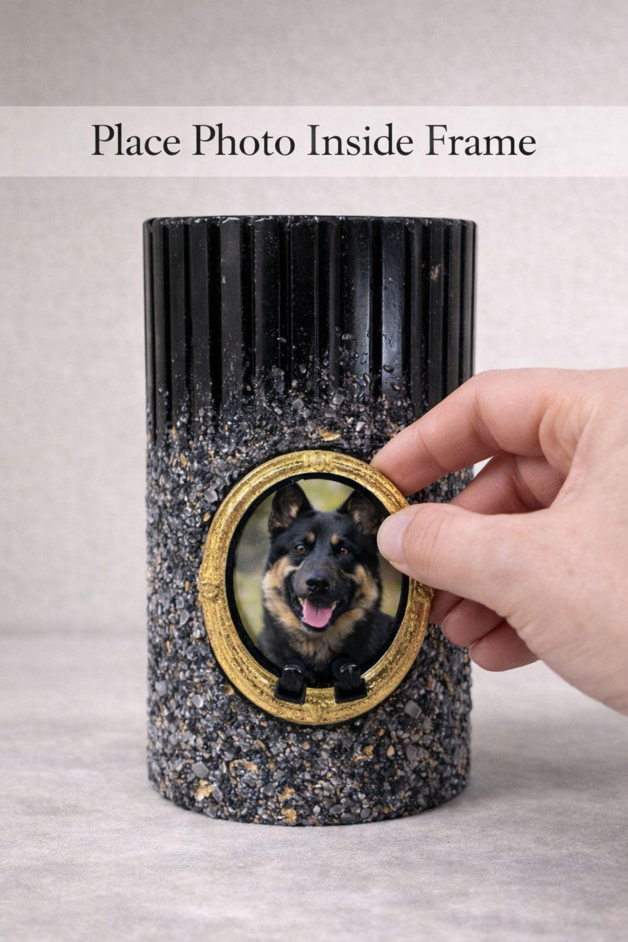 Personalized dog memorial candle with photo frame, pet loss sympathy gift featuring custom dog photo in gold oval frame, remembrance candle for loss of a dog, pet memory candle with textured black holder and lit candle flame, thoughtful pet memorial gift for grieving dog owners, dog remembrance keepsake, personalized pet loss candle, pet sympathy gift idea for loss of beloved dog companion.