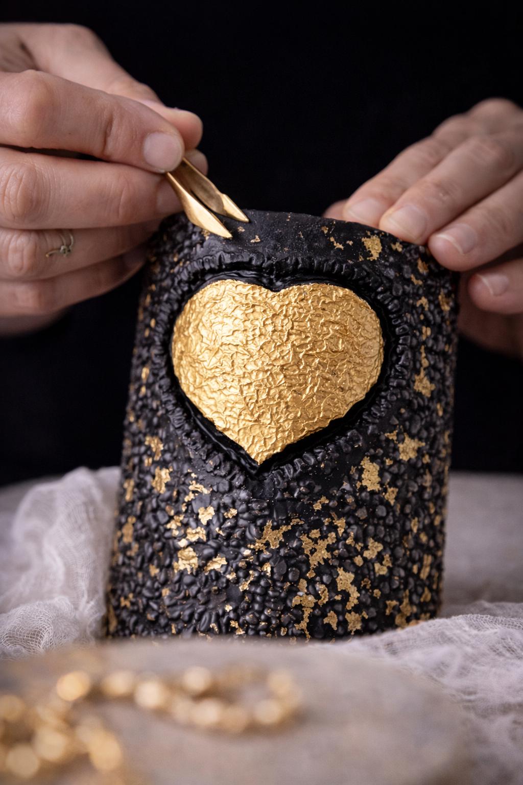 Handcrafted black gold sculptural candle making process, artisan shaping gold heart detail, luxury decorative candle, handmade artistic candle, unique gift for her, modern home decor candle
