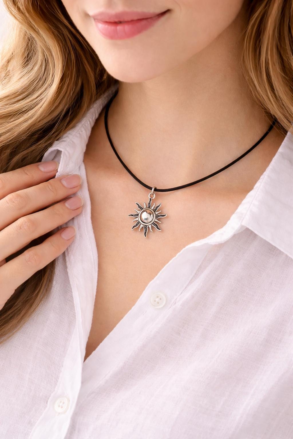 silver sun pendant necklace on woman neck clean background minimalist celestial jewelry black cord choker sun charm necklace gift for her elegant style
