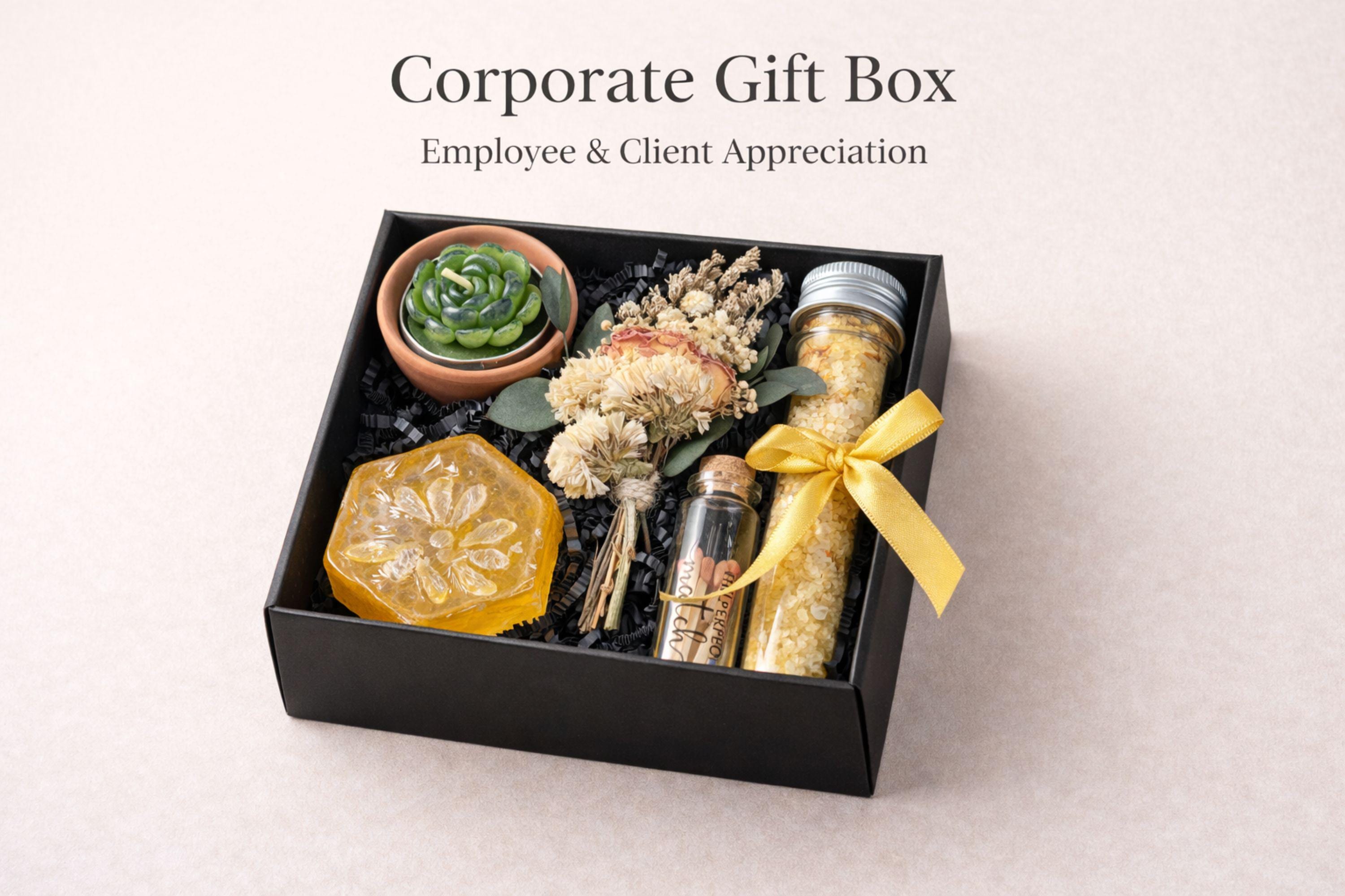 Corporate gift box for employee appreciation and client thank you gifting featuring handmade candle, bath salts, artisan soap, matches and dried flowers in elegant black box with yellow ribbon, compact 6x6 inch business gift set perfect for bulk corporate orders, office gifting, team appreciation, professional relationships and direct shipping to recipients
