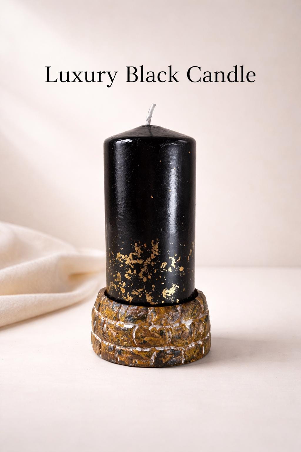 black decorative candle with gold accents luxury minimalist home decor