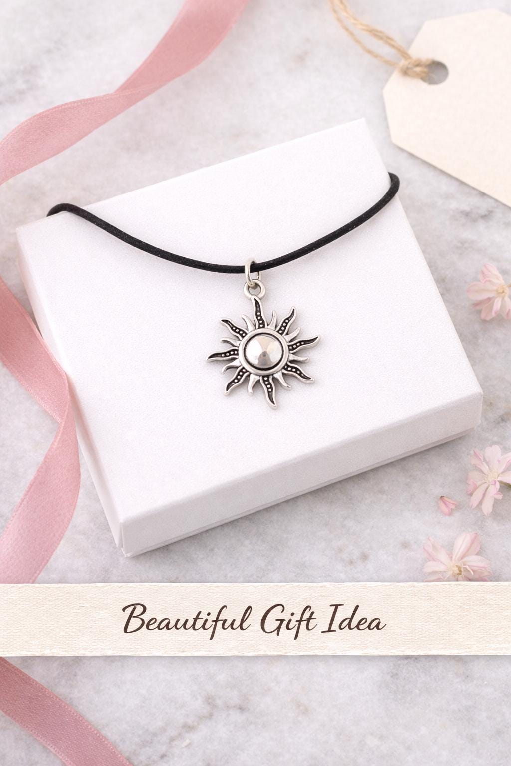 silver sun pendant necklace on gift box packaging minimalist celestial jewelry gift for her sun charm necklace ready to gift elegant presentation