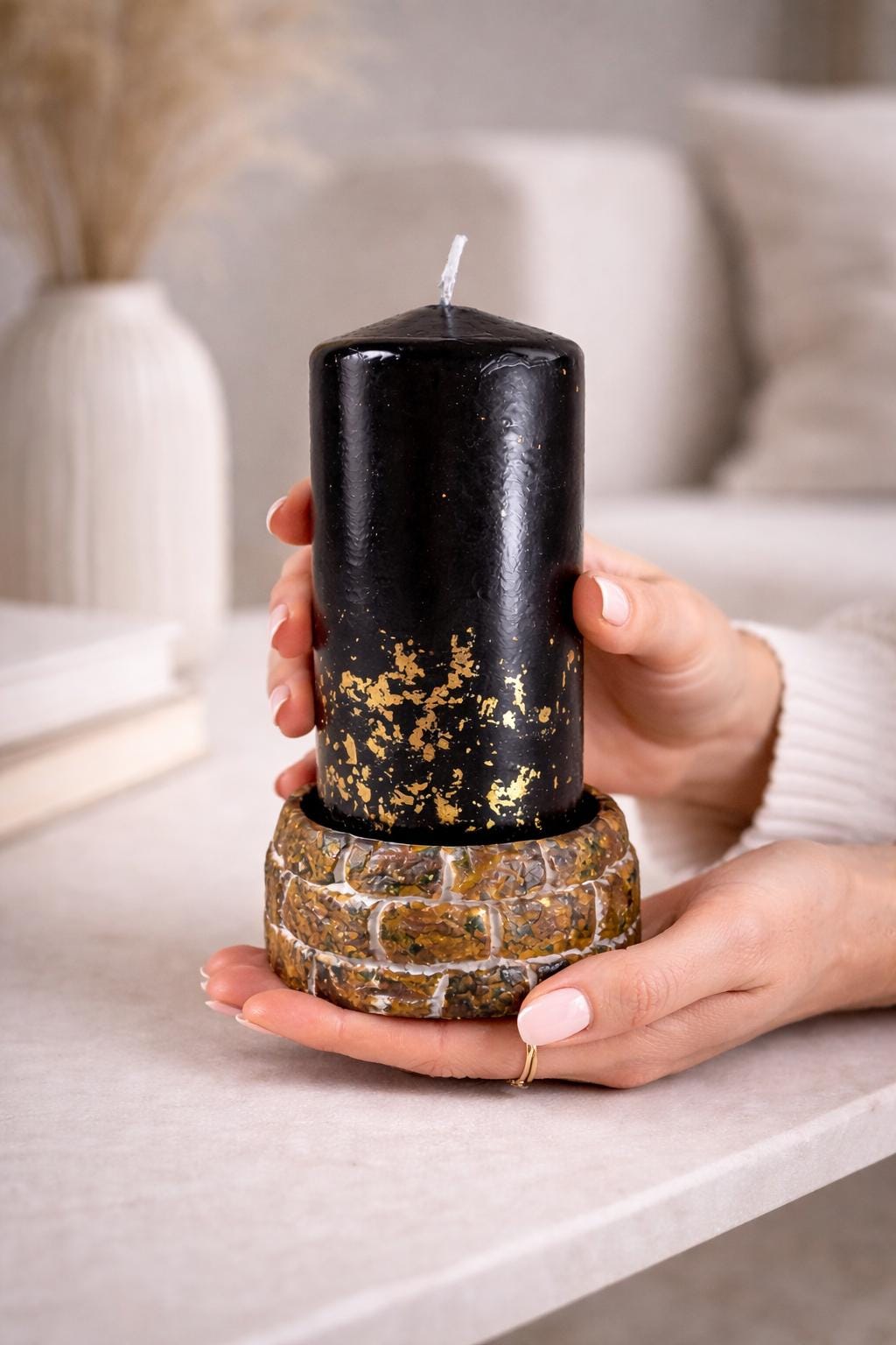 black decorative candle held in hands luxury home decor size reference