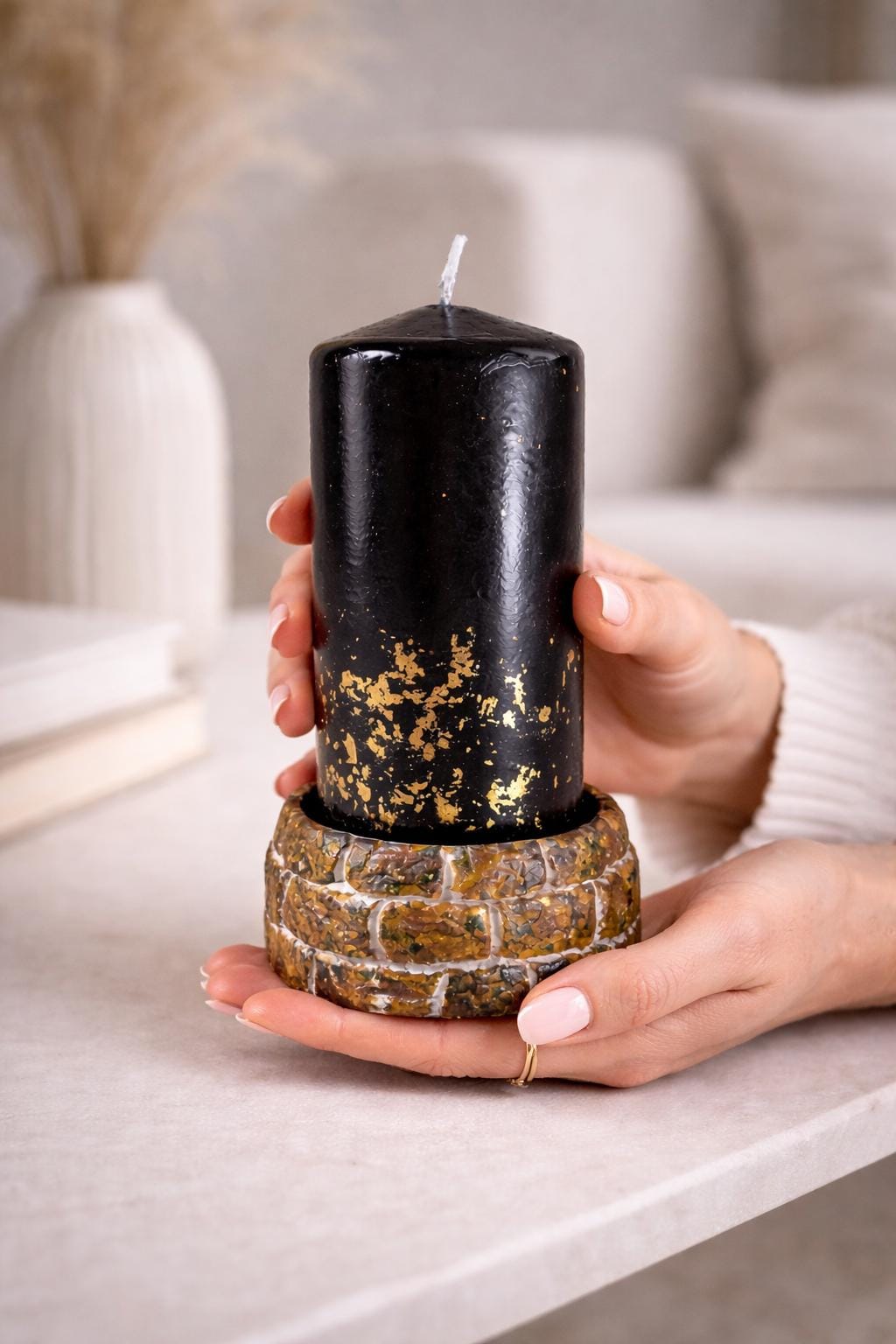 decorative black candle held in hands size reference aesthetic decor