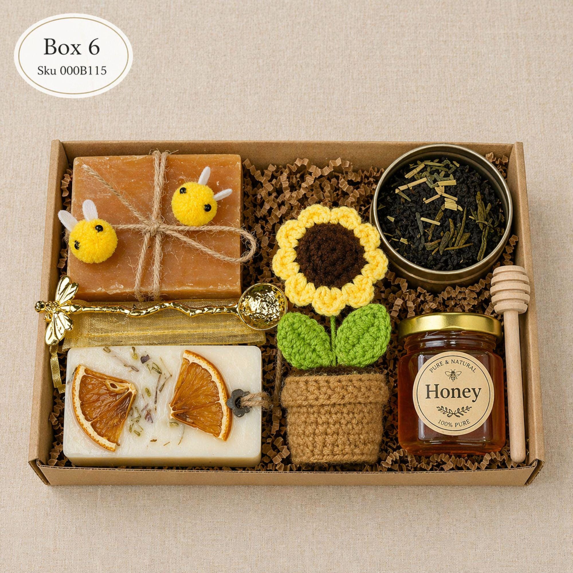 Teacher appreciation gift box with handmade botanical soap, loose leaf tea, honey jar, wooden honey dipper, crochet sunflower, gold spoon and cozy self care packaging. Unique thank you teacher gift basket for women, daycare teacher, mentor, tutor, preschool teacher or end of year teacher appreciation week gift. Relaxation spa style teacher box with artisan handmade items and premium ready to gift packaging.